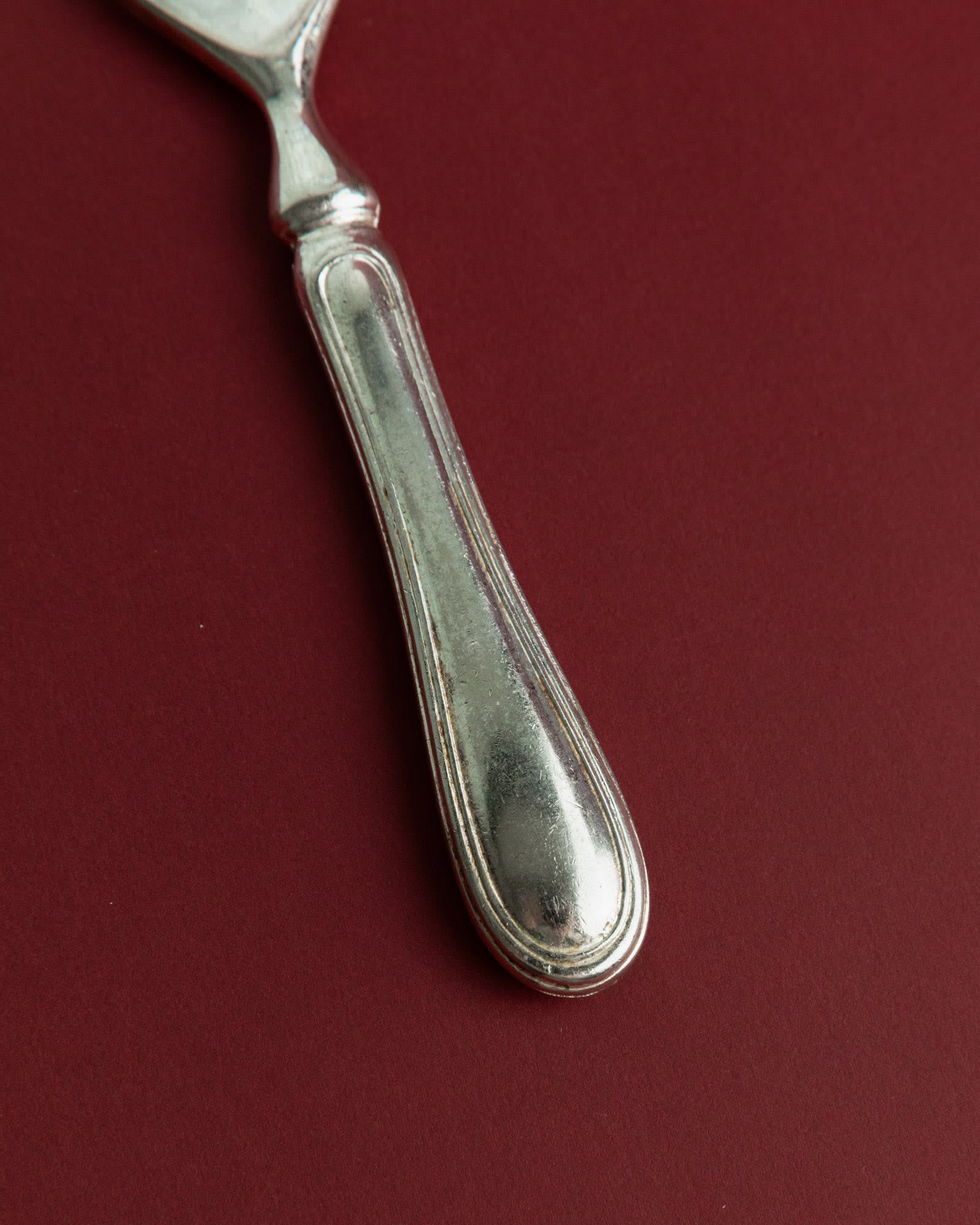 Vintage 1960s Silver Plated Bottle Opener, Classic Minimal Design, Retro Bar Accessory — side angle showing polished silver h