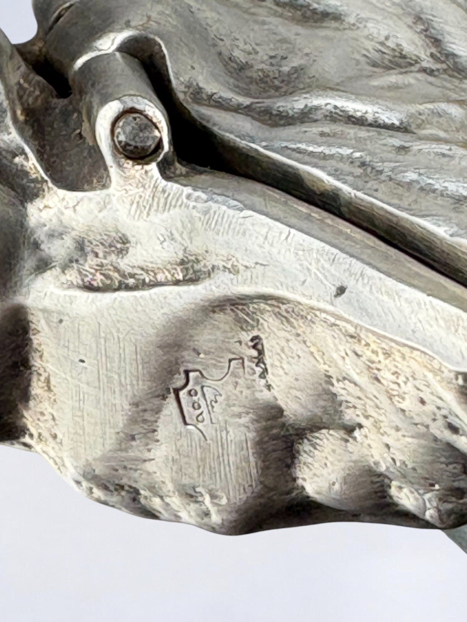 Oyster shell jewelry box in silver, Italy, 1960's — close-up of textured silver surface