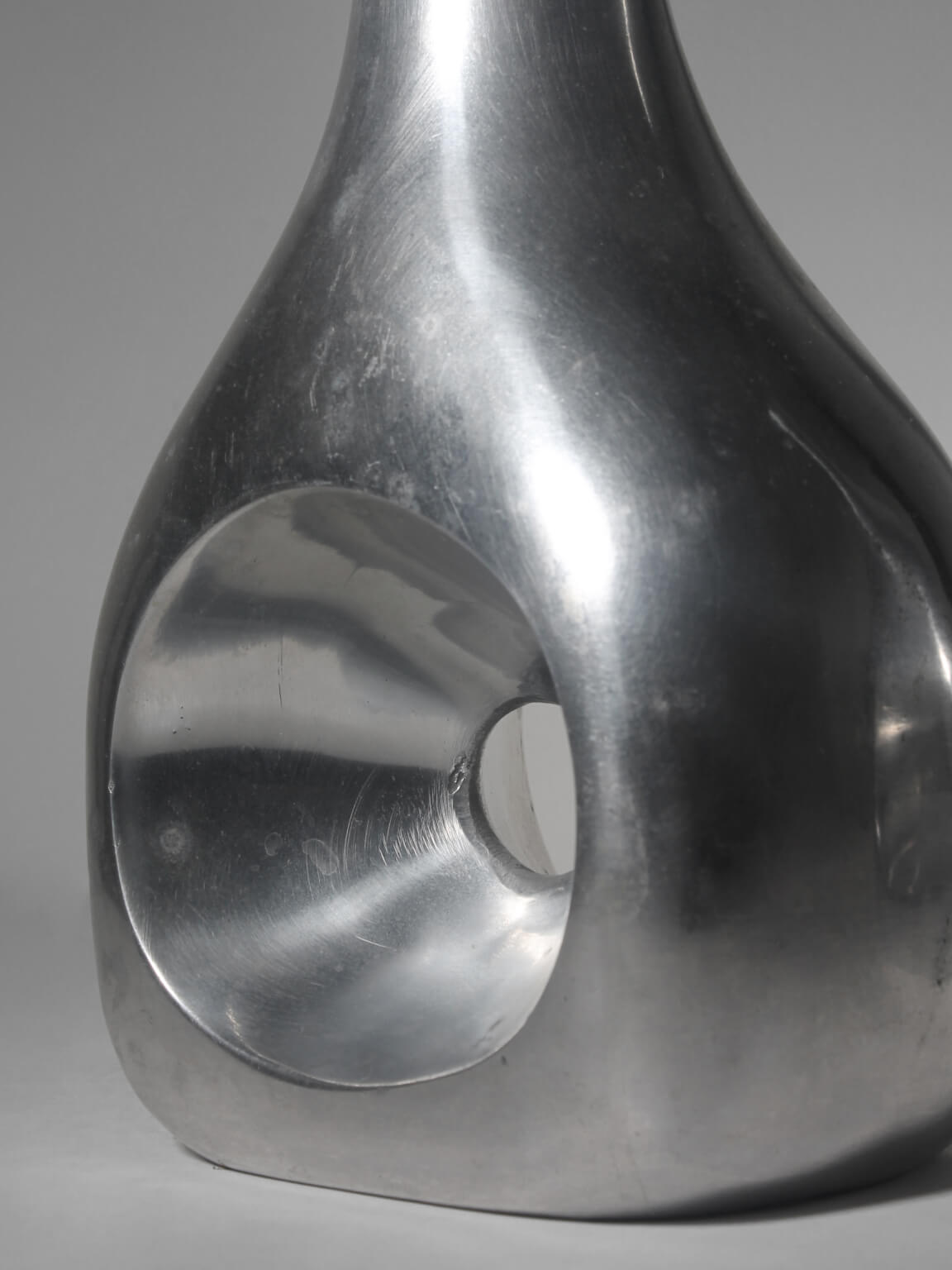 Polished Aluminum Circular Cutout Tall Vases Set — side angle