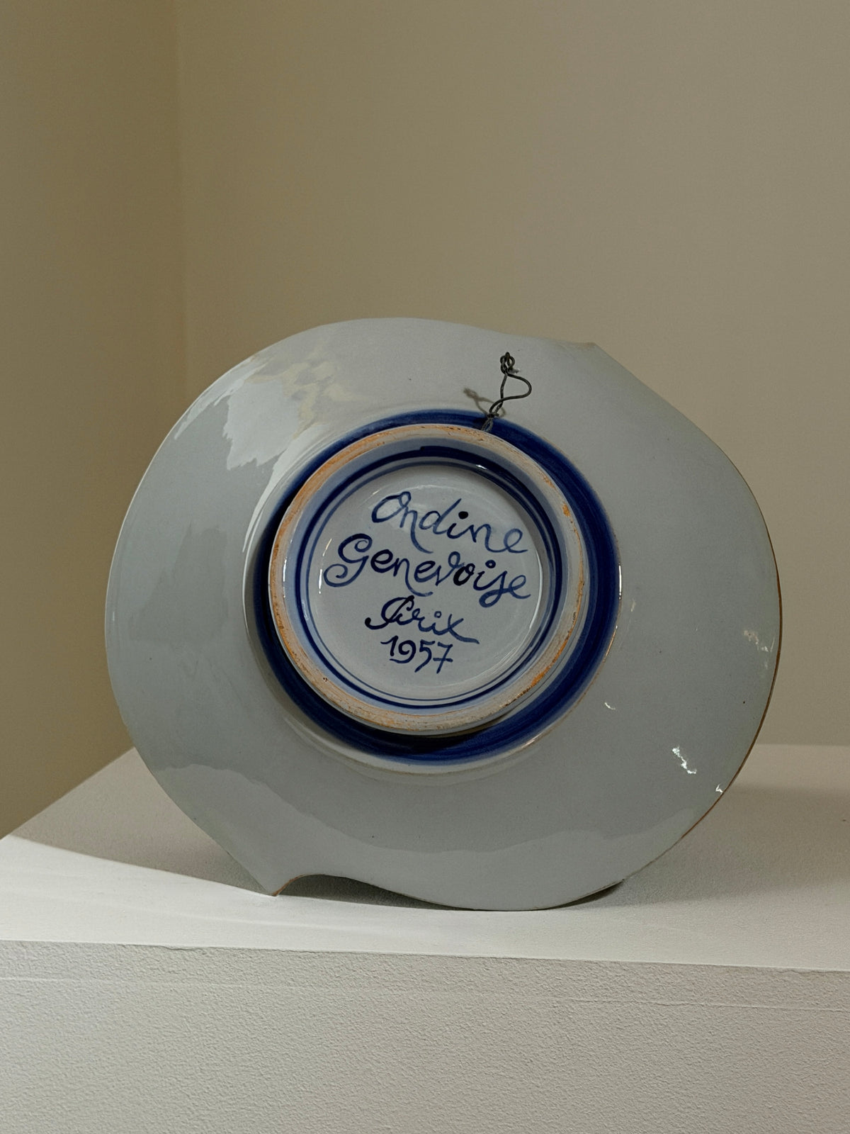 Modernist wall plate, dated 1957 and attributed to Philippe Lambercy.  — detail view