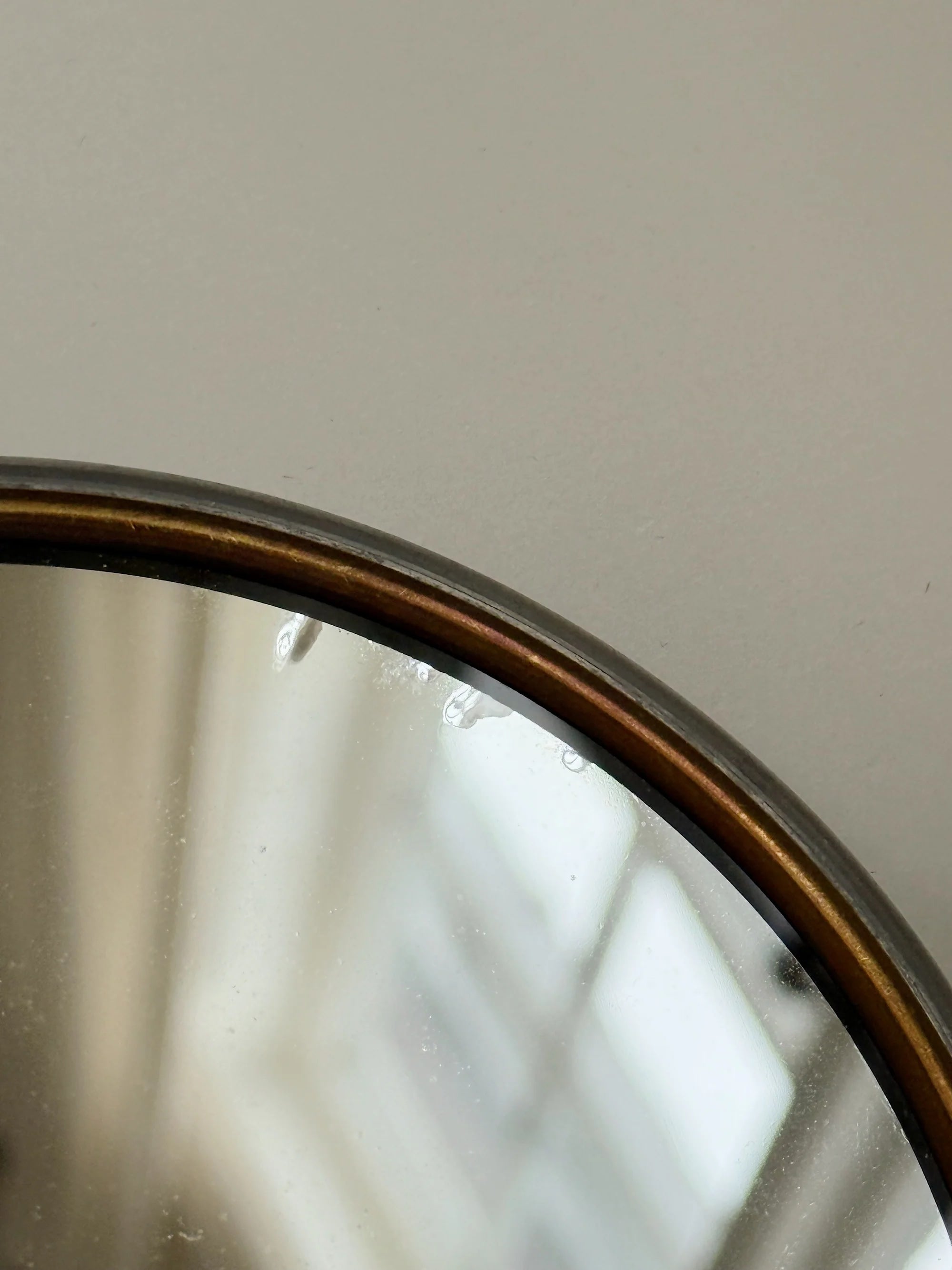 CG Hallberg Hand Mirror in Pewter, Swedish Grace, 1933 — top view showing reflective surface and metal rim