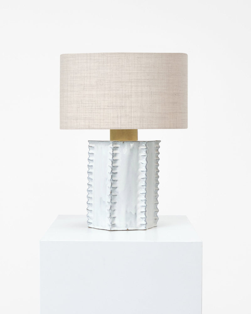 Totem Table Light — close-up of white ceramic base with linen shade