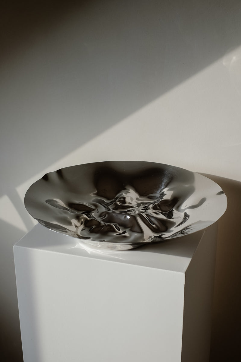Chrome Curved Decorative Bowl by septembre studios | The Oblist — polished metal finish