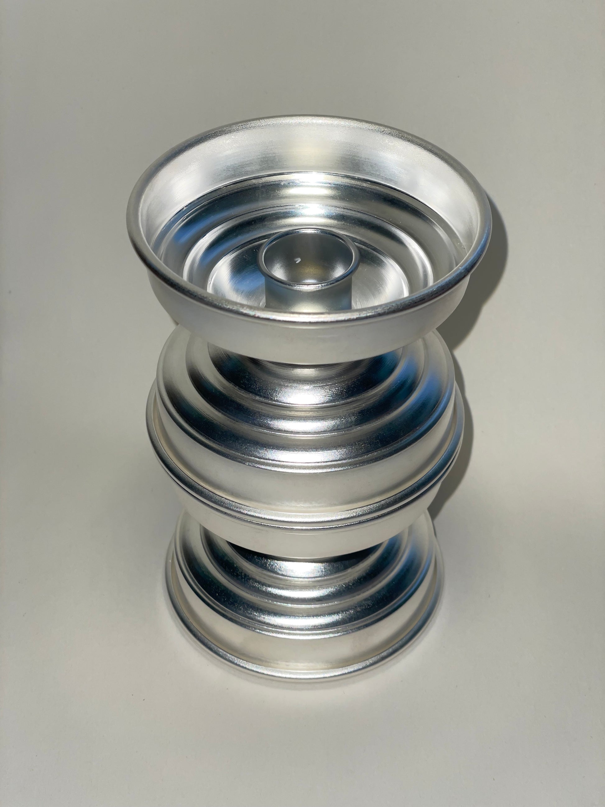 Silver Plated Candle Holders in Brass — top view showing layered design