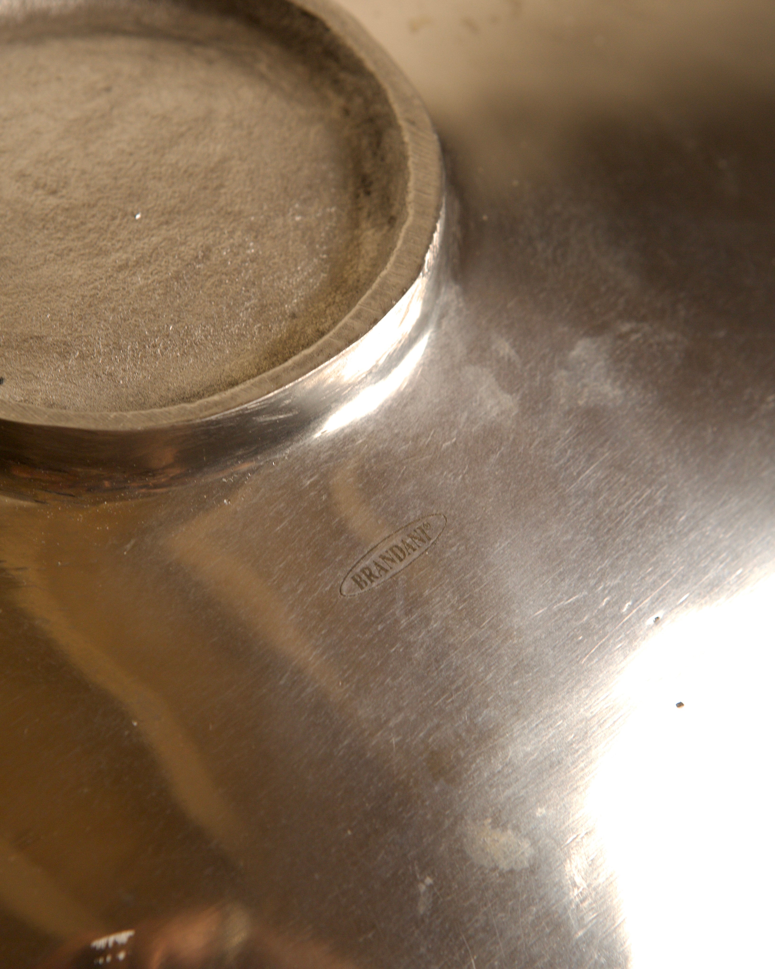 "Galassia" aluminum dish, orange center, Brandani, Italy, 1980s — close-up