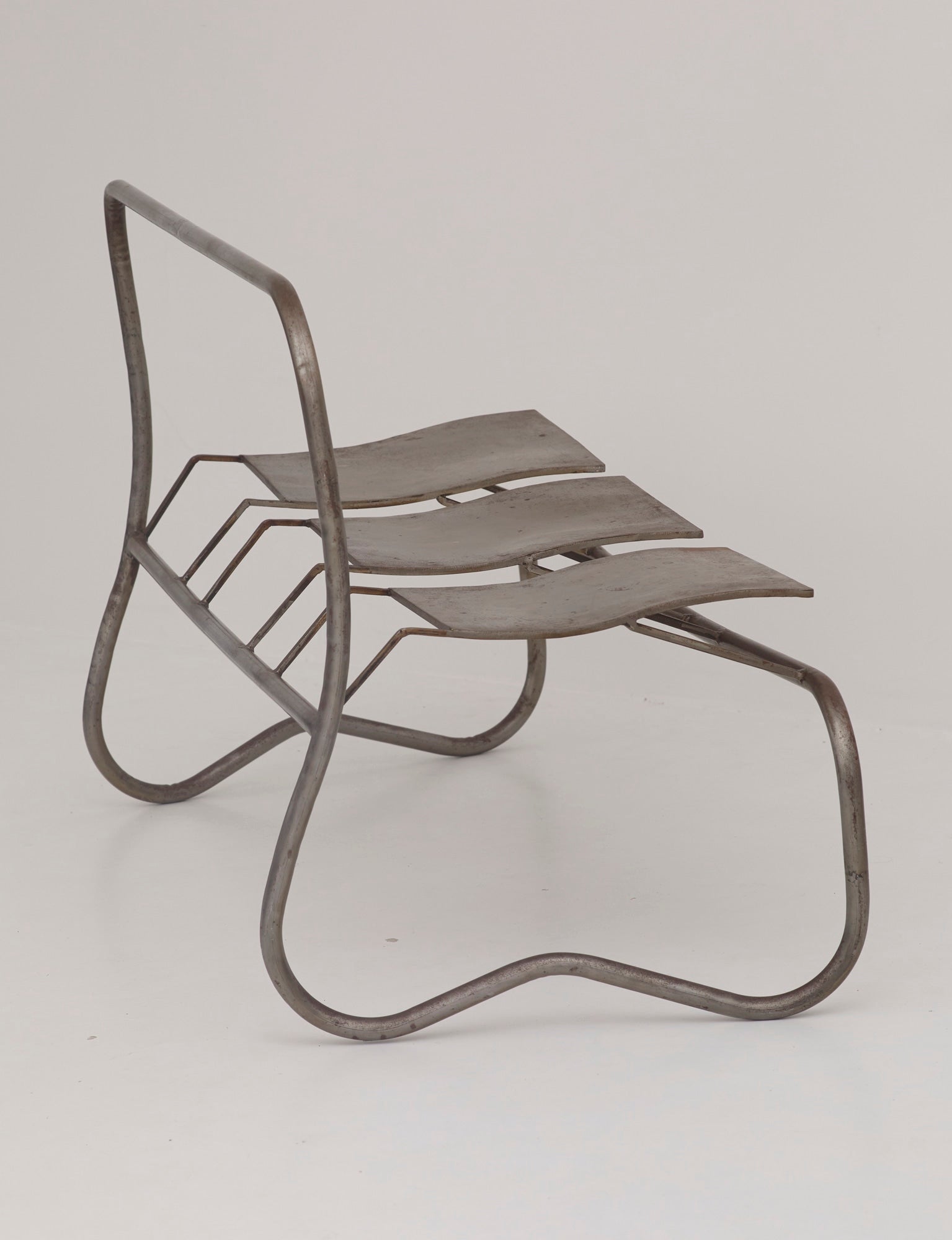 Unique Signed Artist Bench / Settee in Metal — side angle showing metal frame design