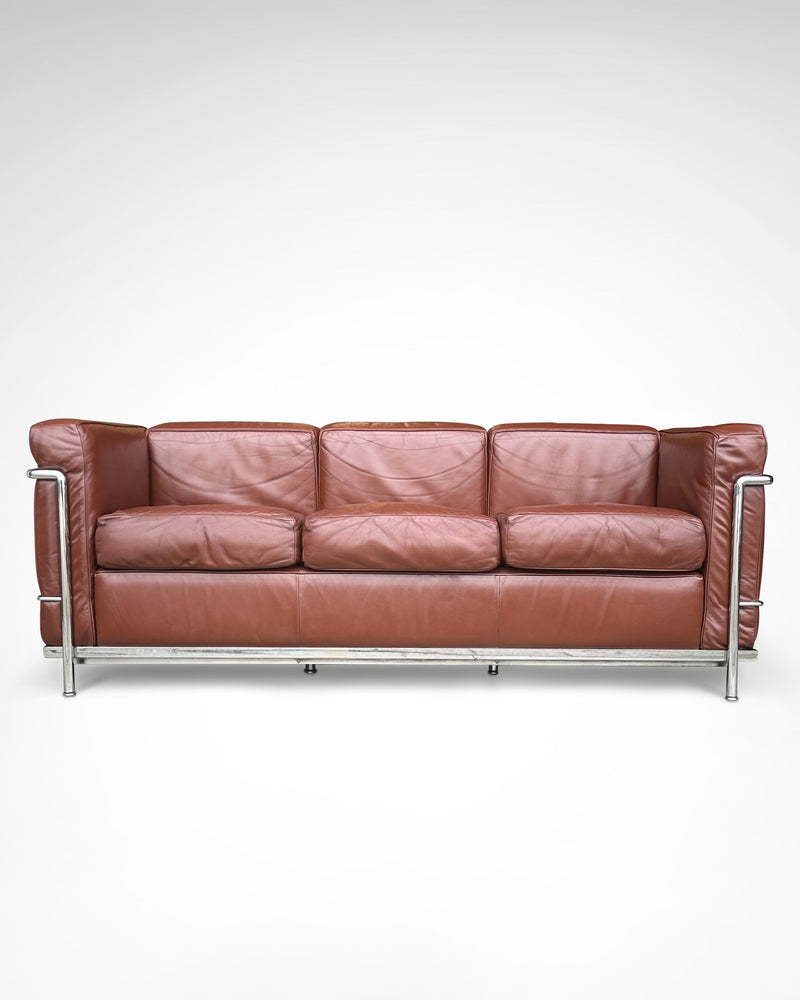Early production LC2 leather 3-seater sofa by Le Corbusier et al Cassina 1970s by Redesignable | The Oblist — brown leather,