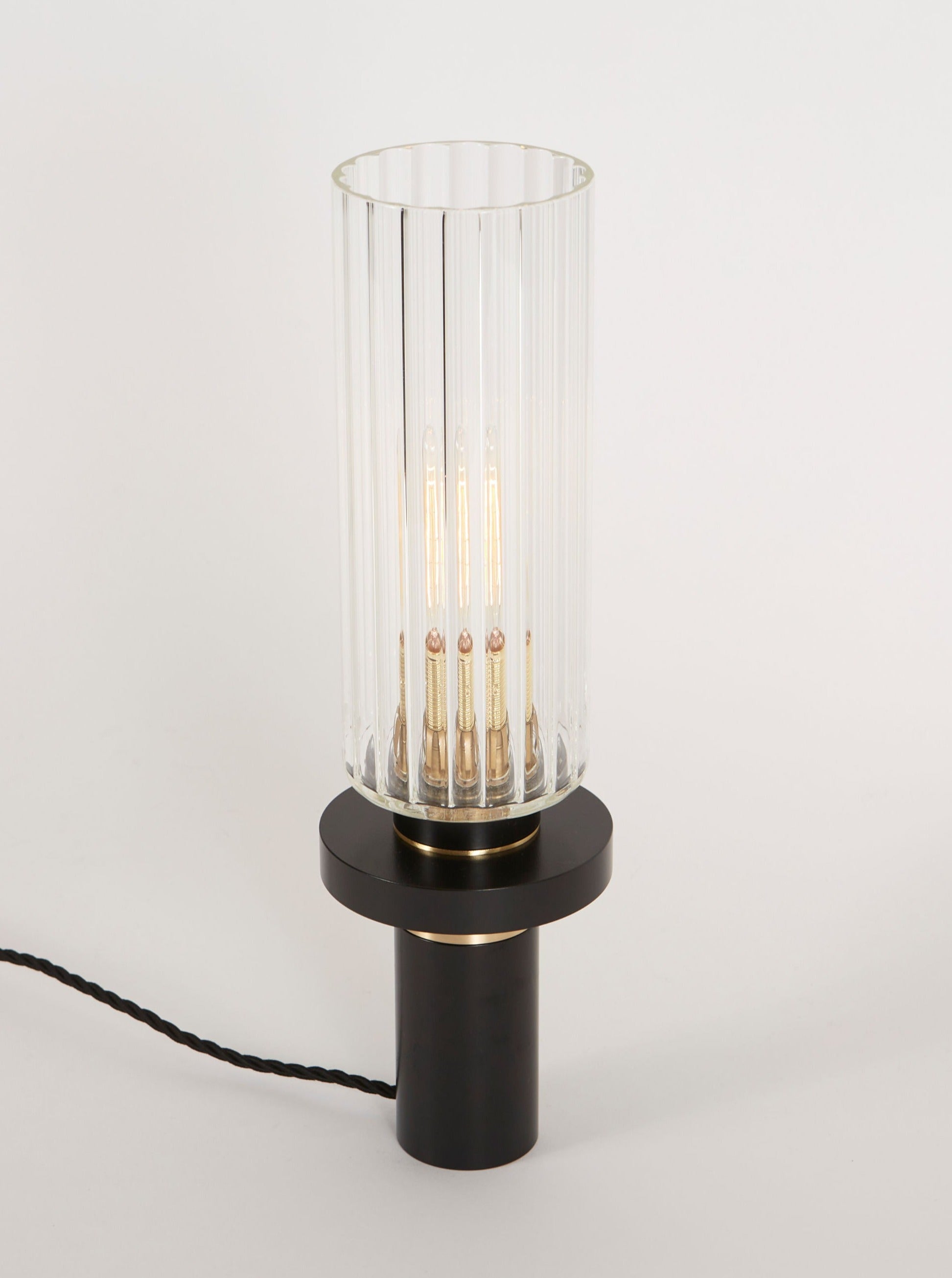 Alexandre Table Lamp — top view of glass shade and black base