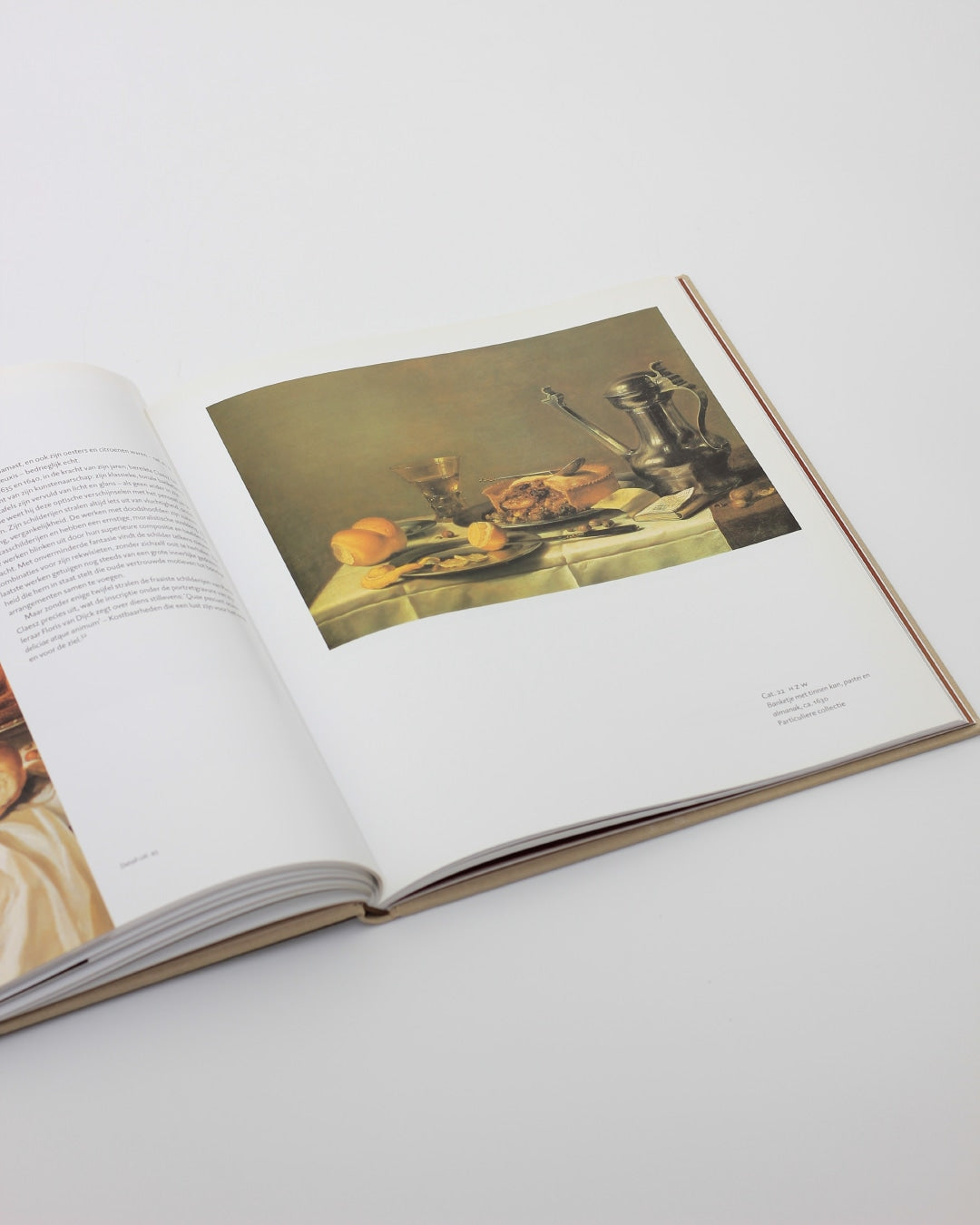 PIETER CLAESZ — top view of open book on white surface