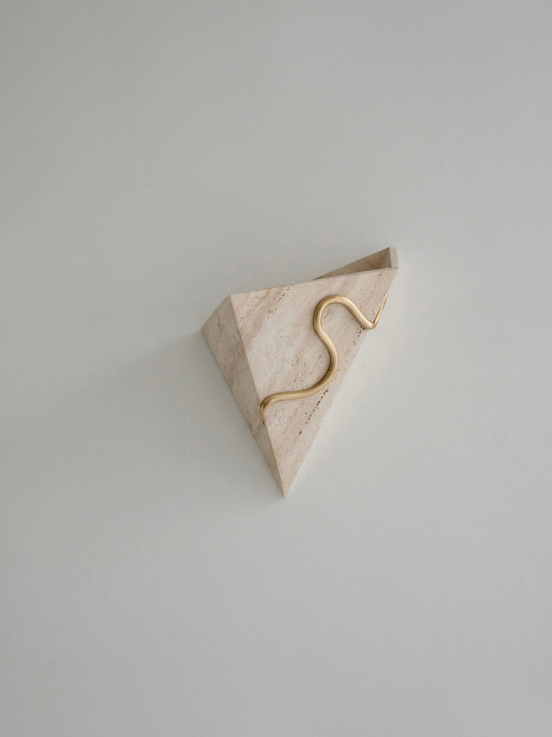Therapeutic Travertine Wall Light — close-up of travertine with gold accent