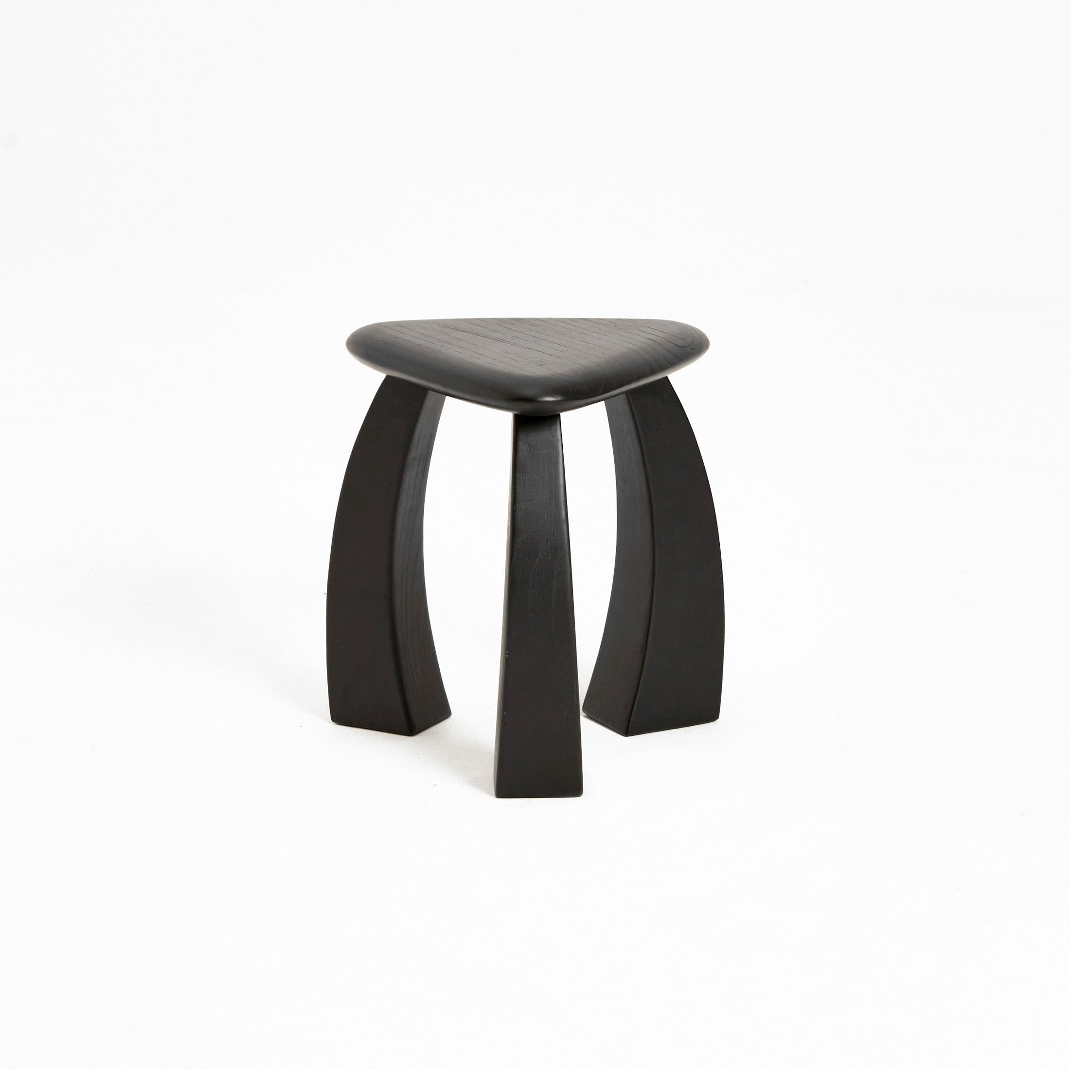 Arc de Stool '37 — angled view of black wooden seat and legs