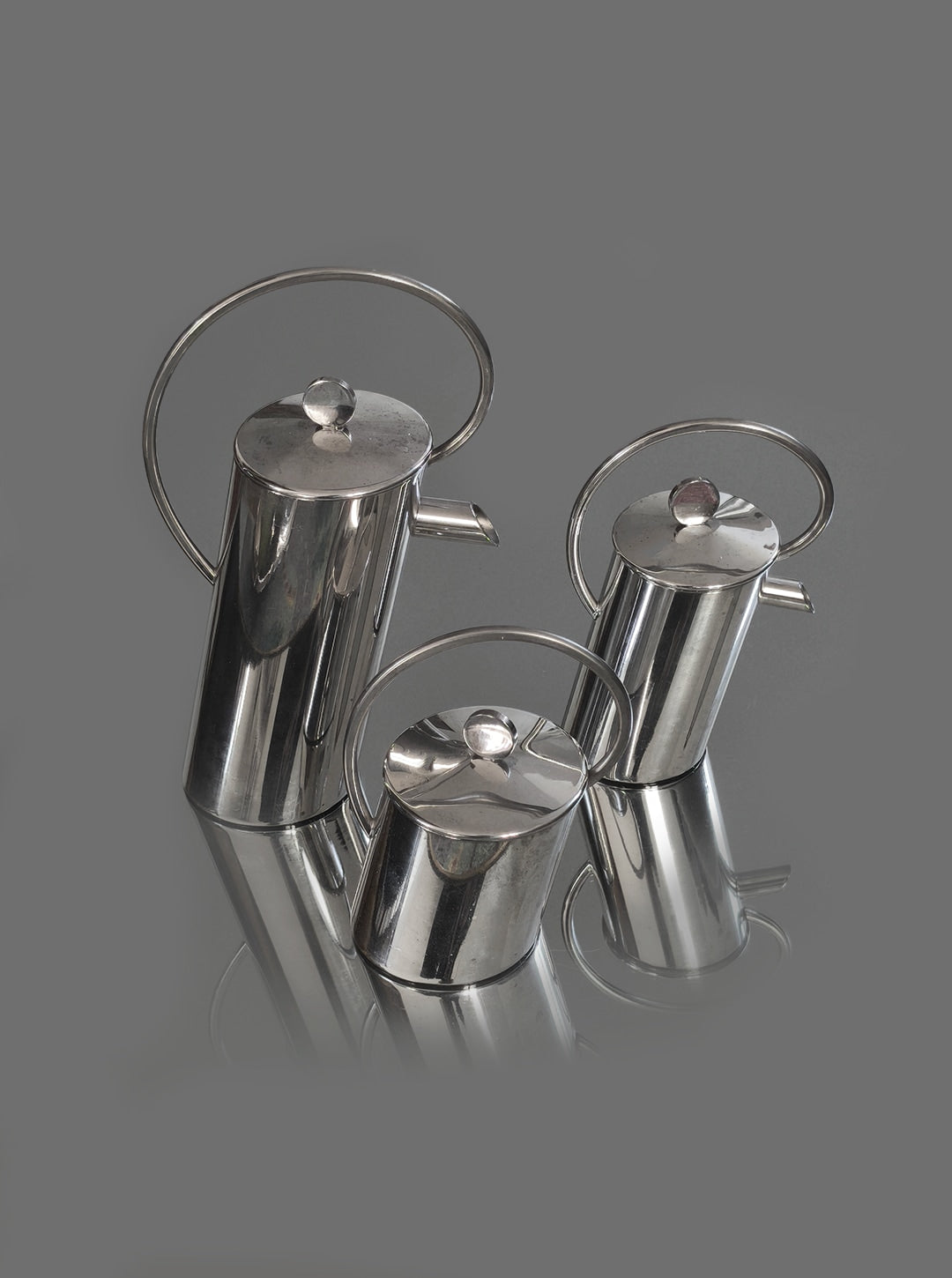 Three-piece silver-plated Italian coffee set with sleek cylindrical design