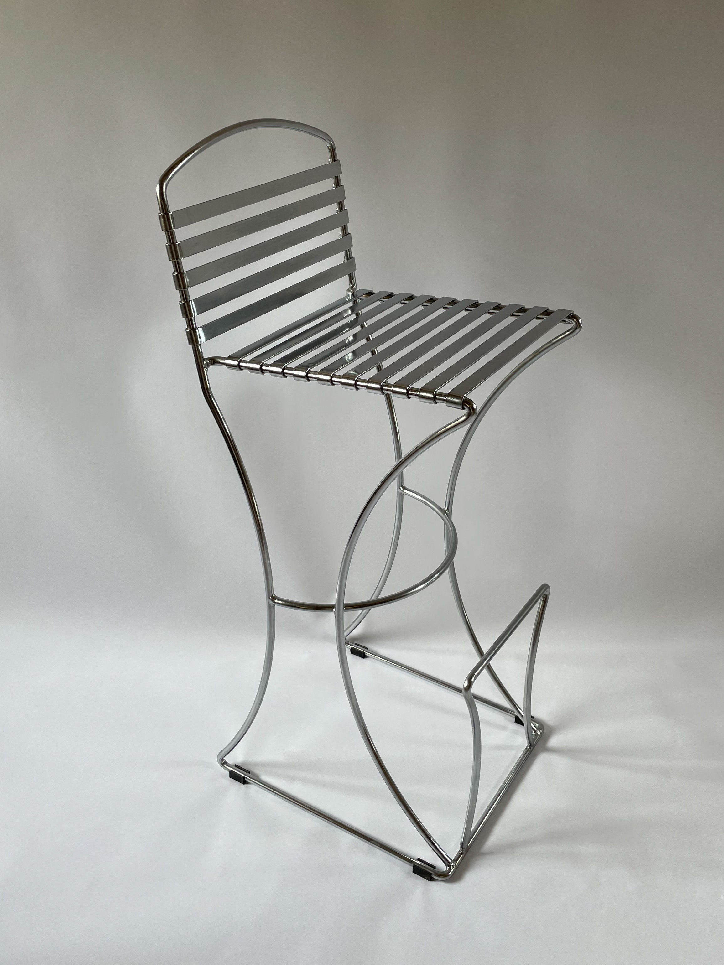 Stool By Till Behrens for Schlubach in Chrome and Steel — angled view highlighting chrome frame and slatted seat