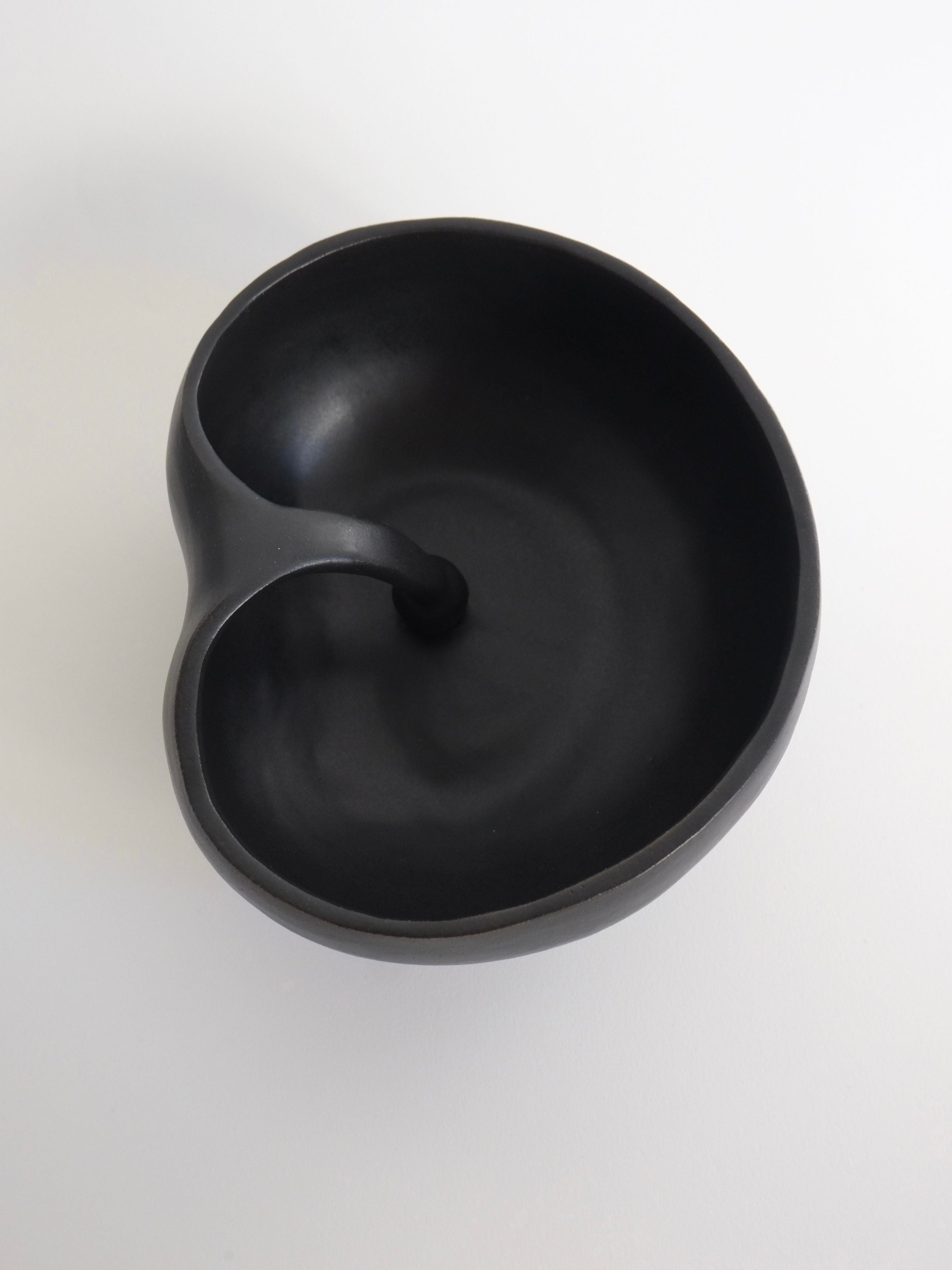 Seed Bowl — top view of black ceramic design