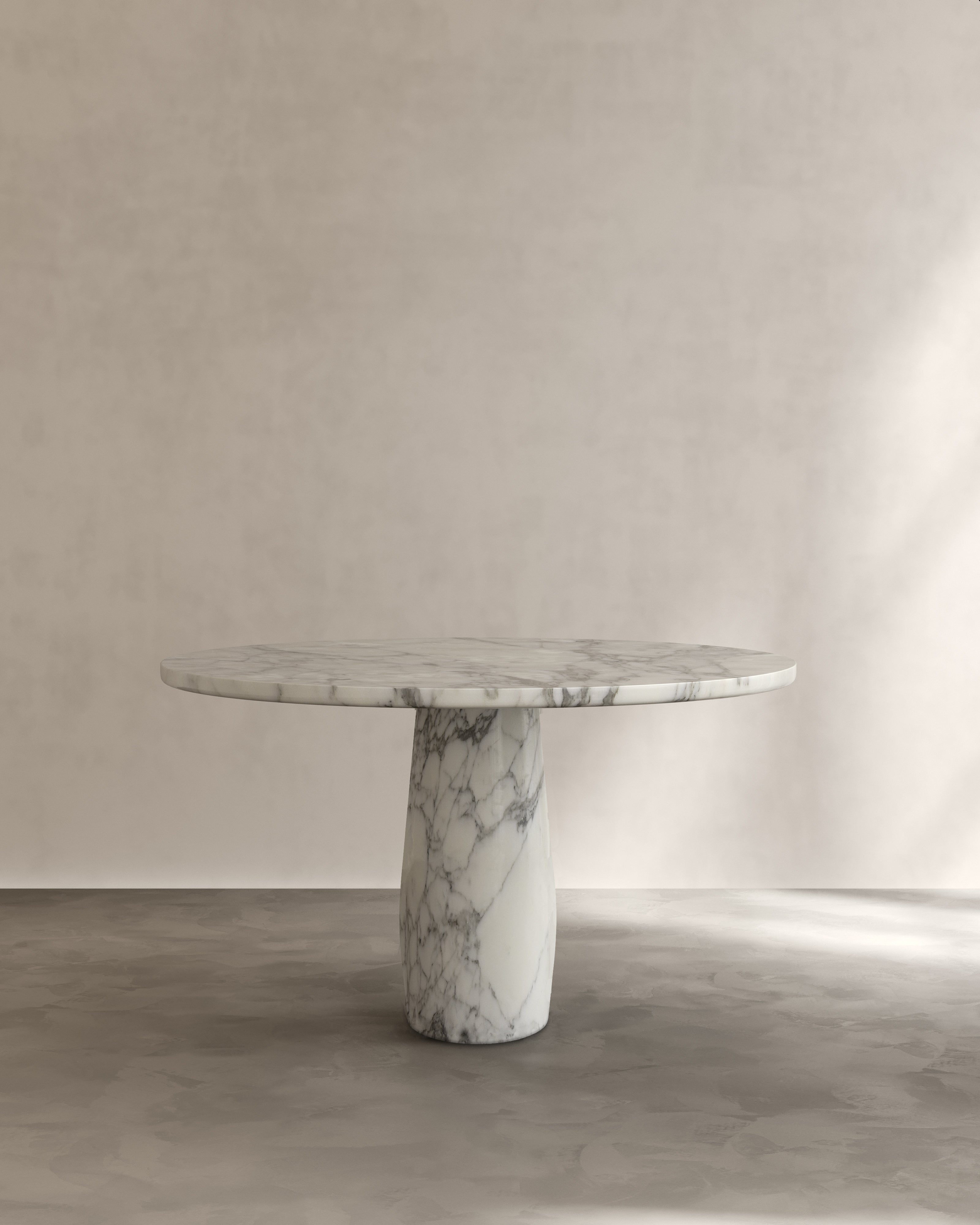Raffaella Table II — side angle of round marble dining table
