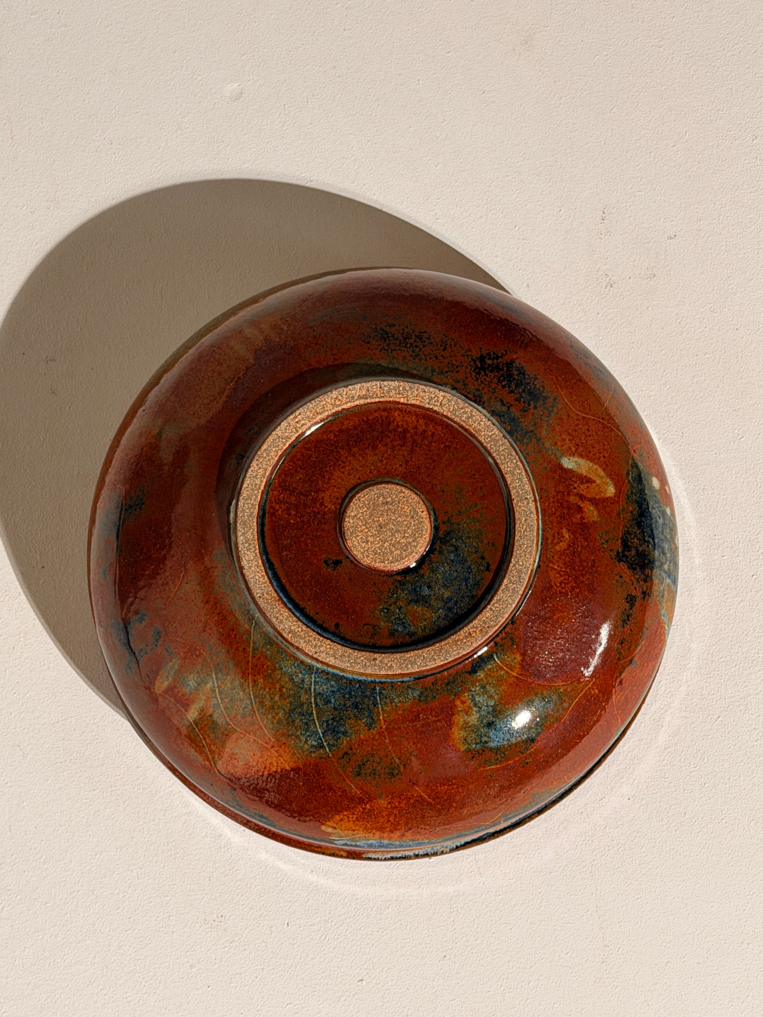 Ceramic dish by Elisabeth Wallet, circa 1960–1970 — top view highlighting earthy glaze colors