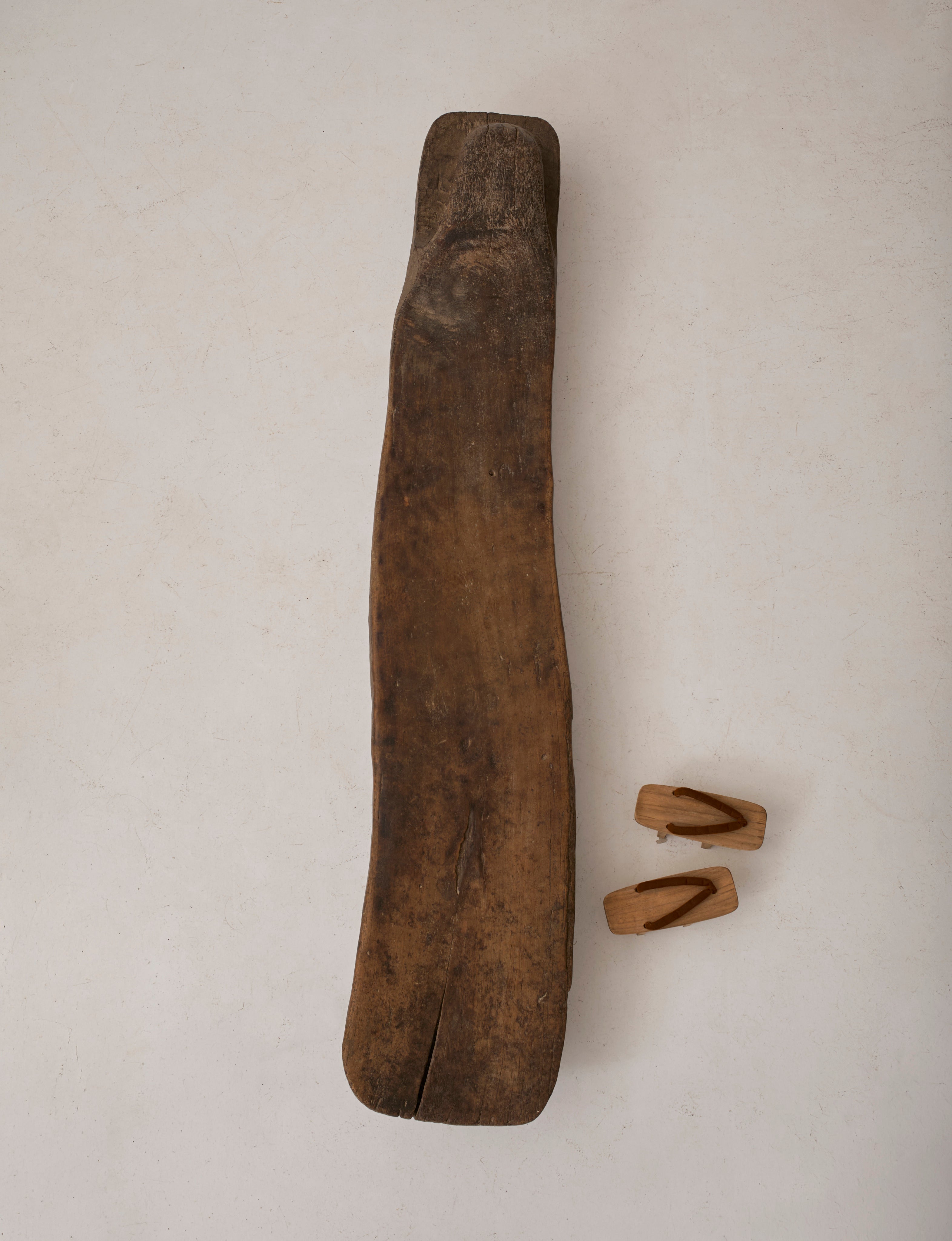 Carved Senufo Bench in Wood — top view of handcrafted wooden seat