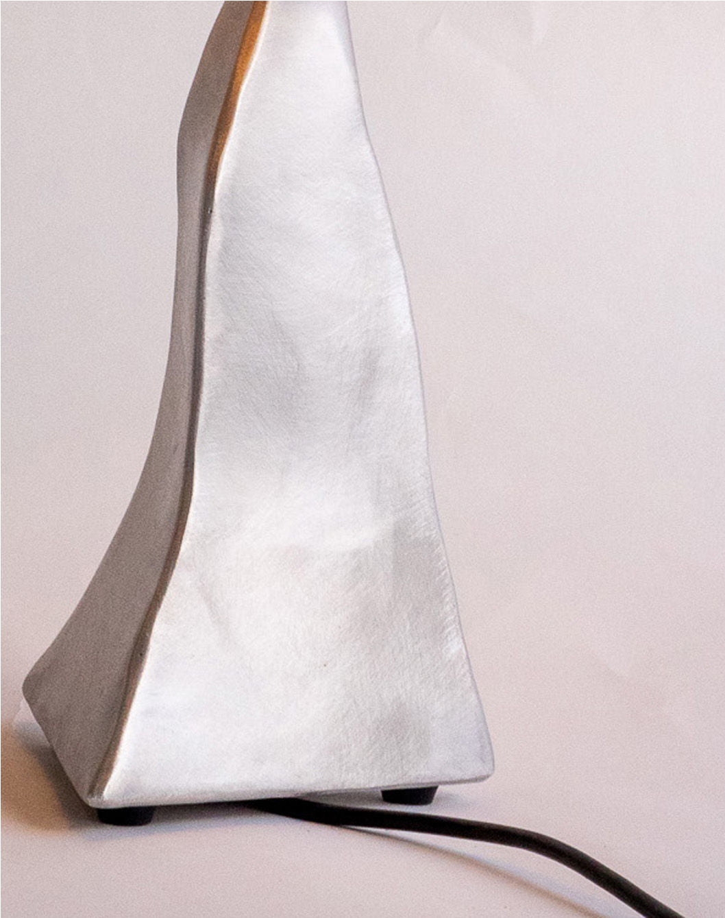 Aluminum 'Paper' Lamp — side angle showing textured silver surface