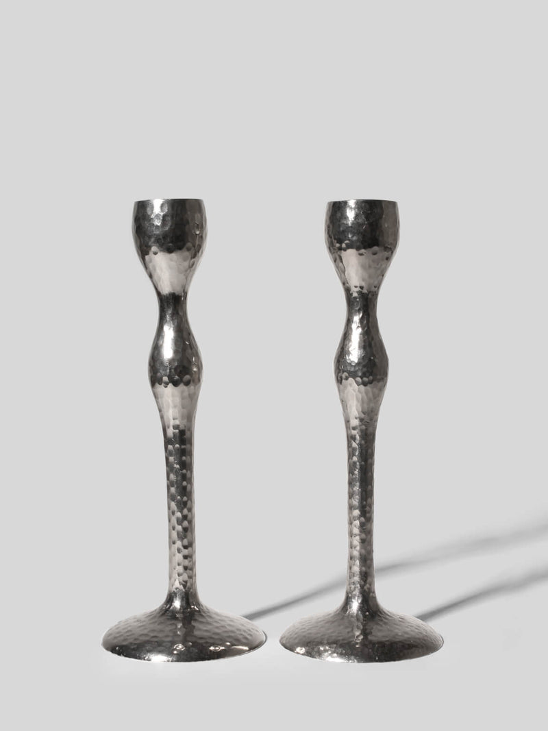 Pair Of Tall Textured Mirror Metal Candlesticks by Vintage Stories | The Oblist