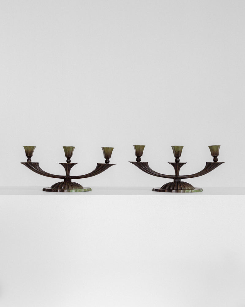 Pair of Art Deco bronze candelabras with curved arms, 1930s Sweden