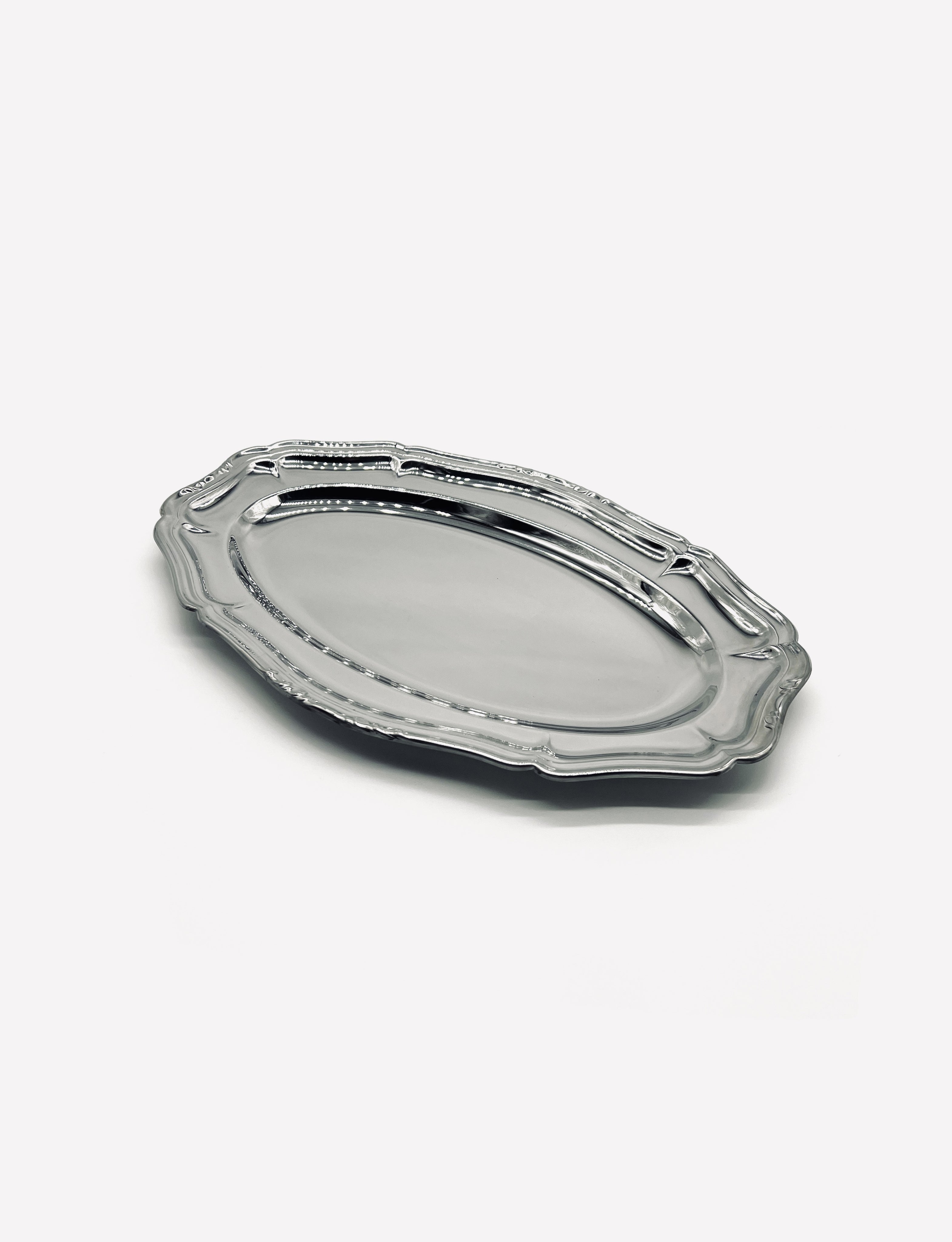 The LA PARADE Medium serving dish is a shiny, oval-shaped vintage stainless steel piece with an ornate decorative edge, shown on a plain white background.