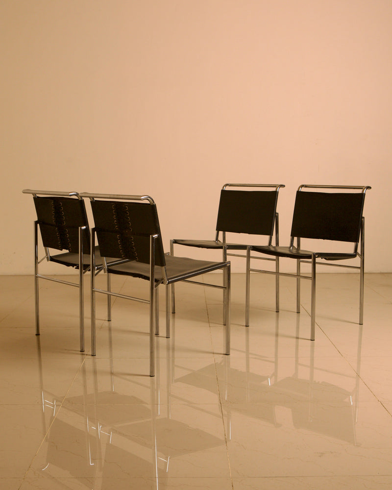 Set of 5 "Roquebrune" chairs in black leather by Eileen Gray 60's — side angle