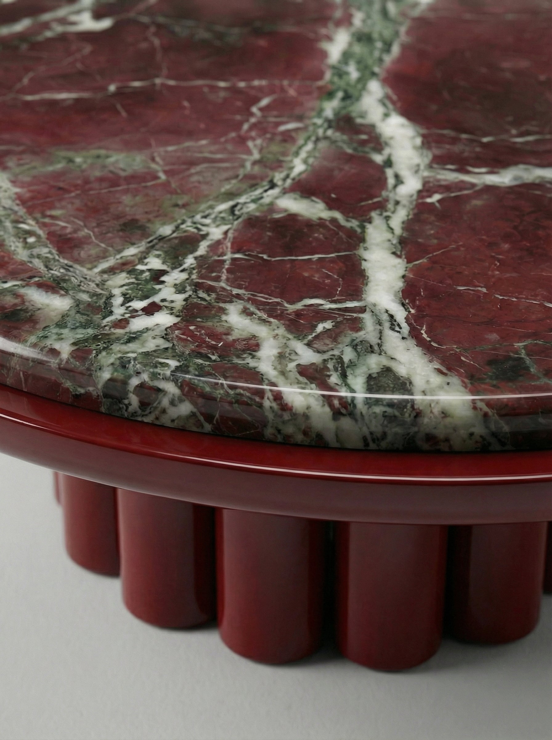 Edoni Bordeaux Lacquered And Rosso Levanto Marble — close-up of marble surface with red and green veins