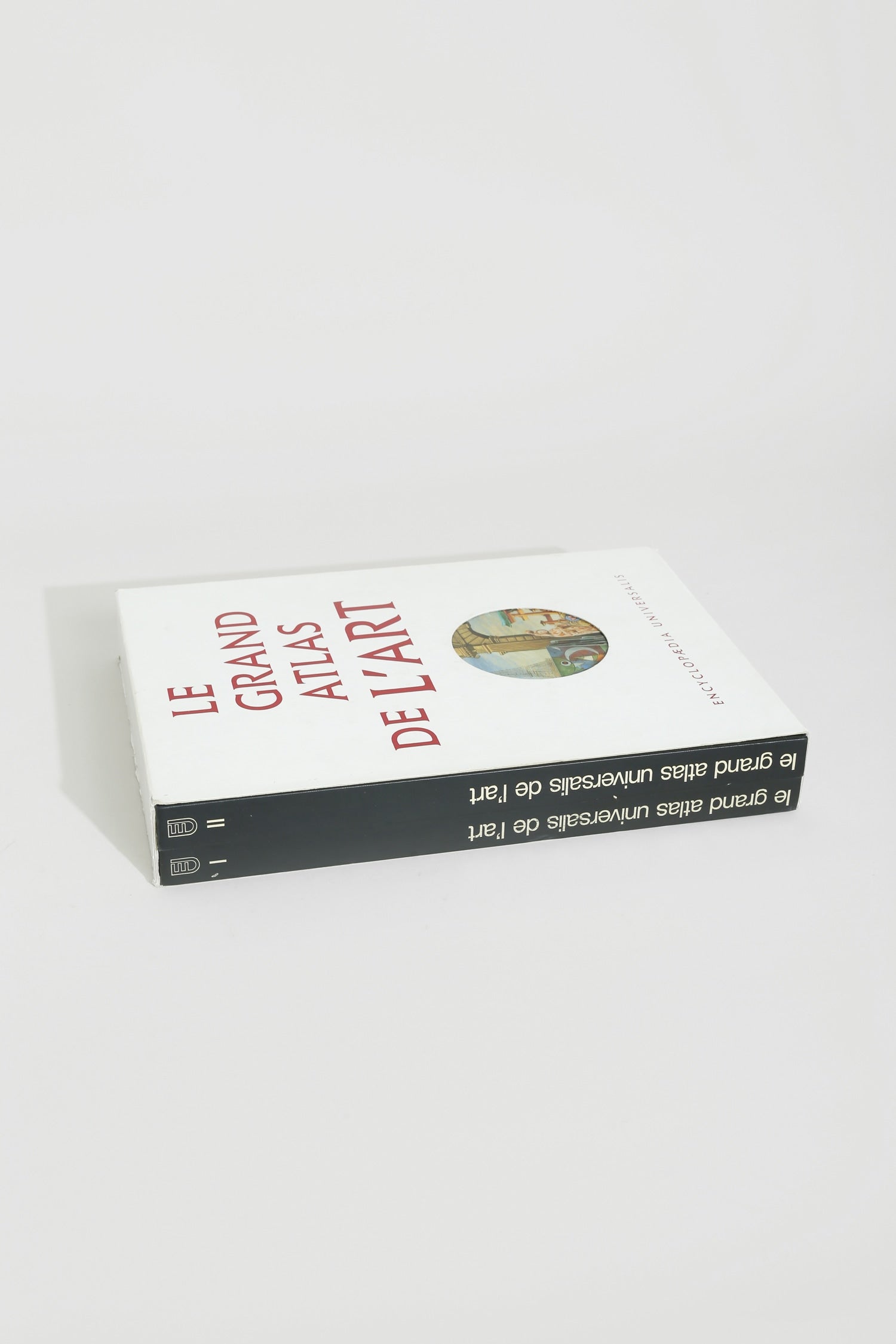 Le Grand Atlas de L’art Book Set — angled view on white surface