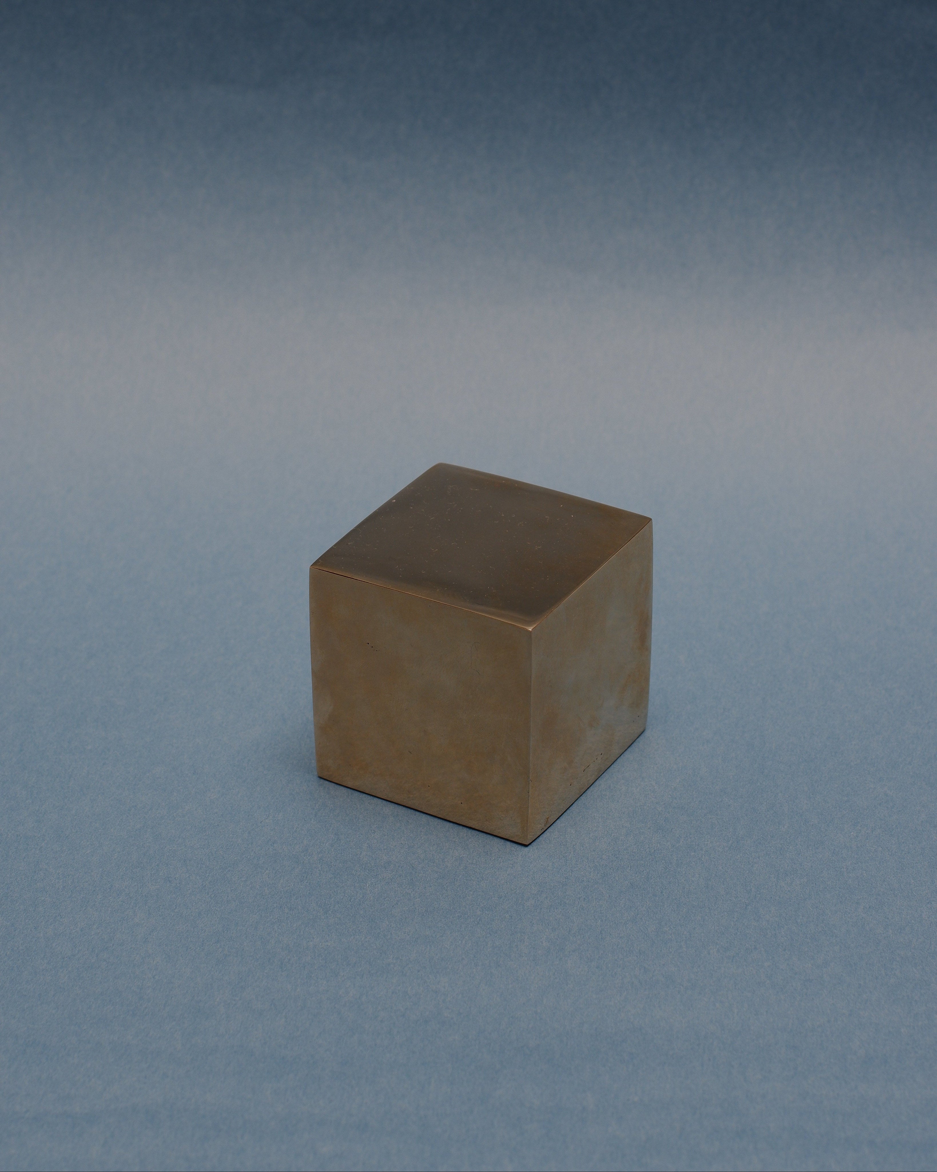 CUBE Cabinet Knob Medium — angled view on blue background