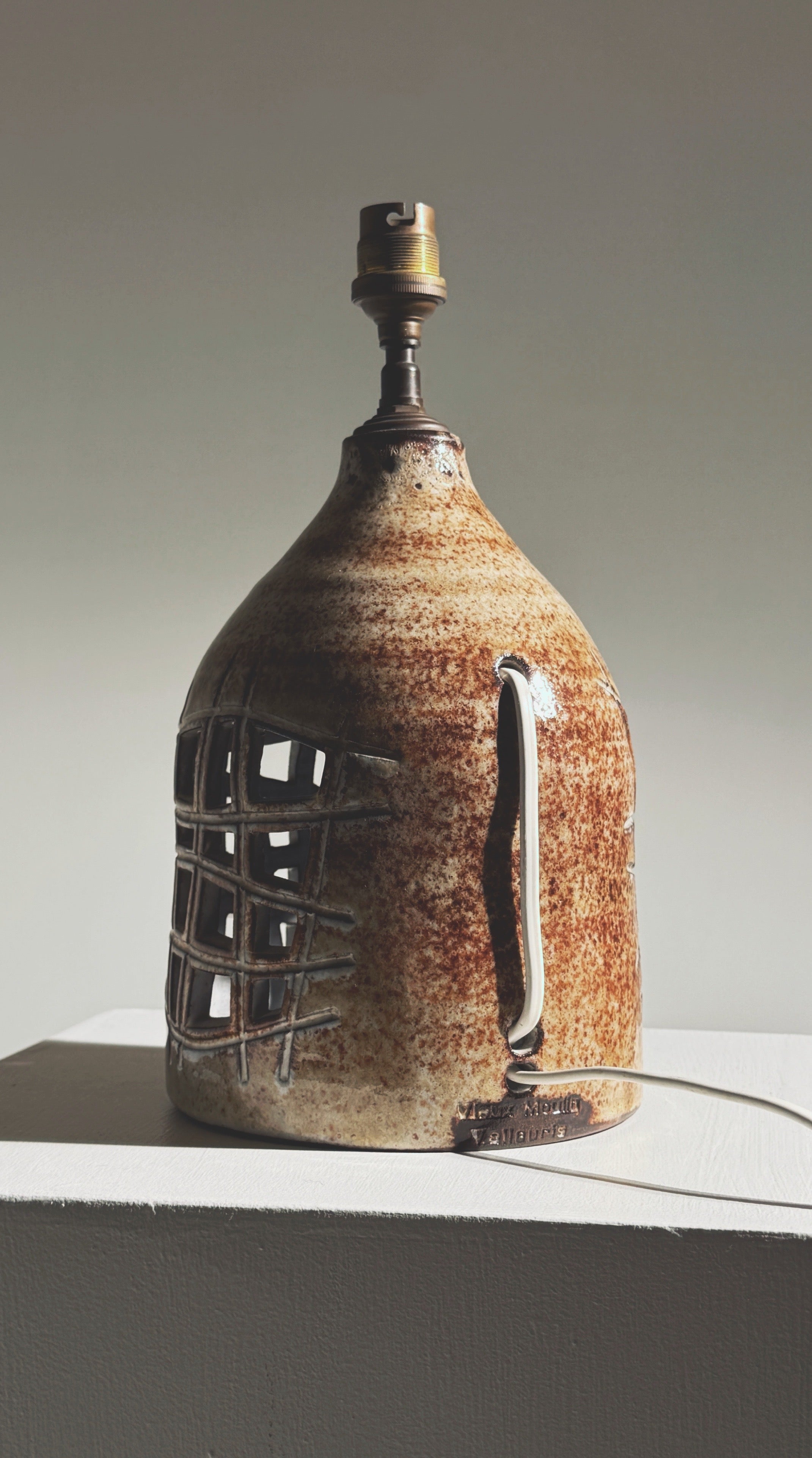 Elegant pierced lamp by Robert Pérot, Vallauris, France, circa 1960 — back view highlighting ceramic texture and cord