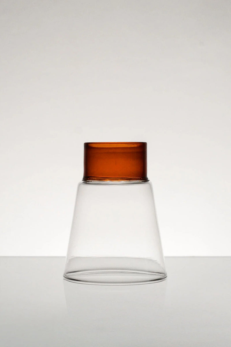 Podio' Glass - Amber — close-up of glass with amber top