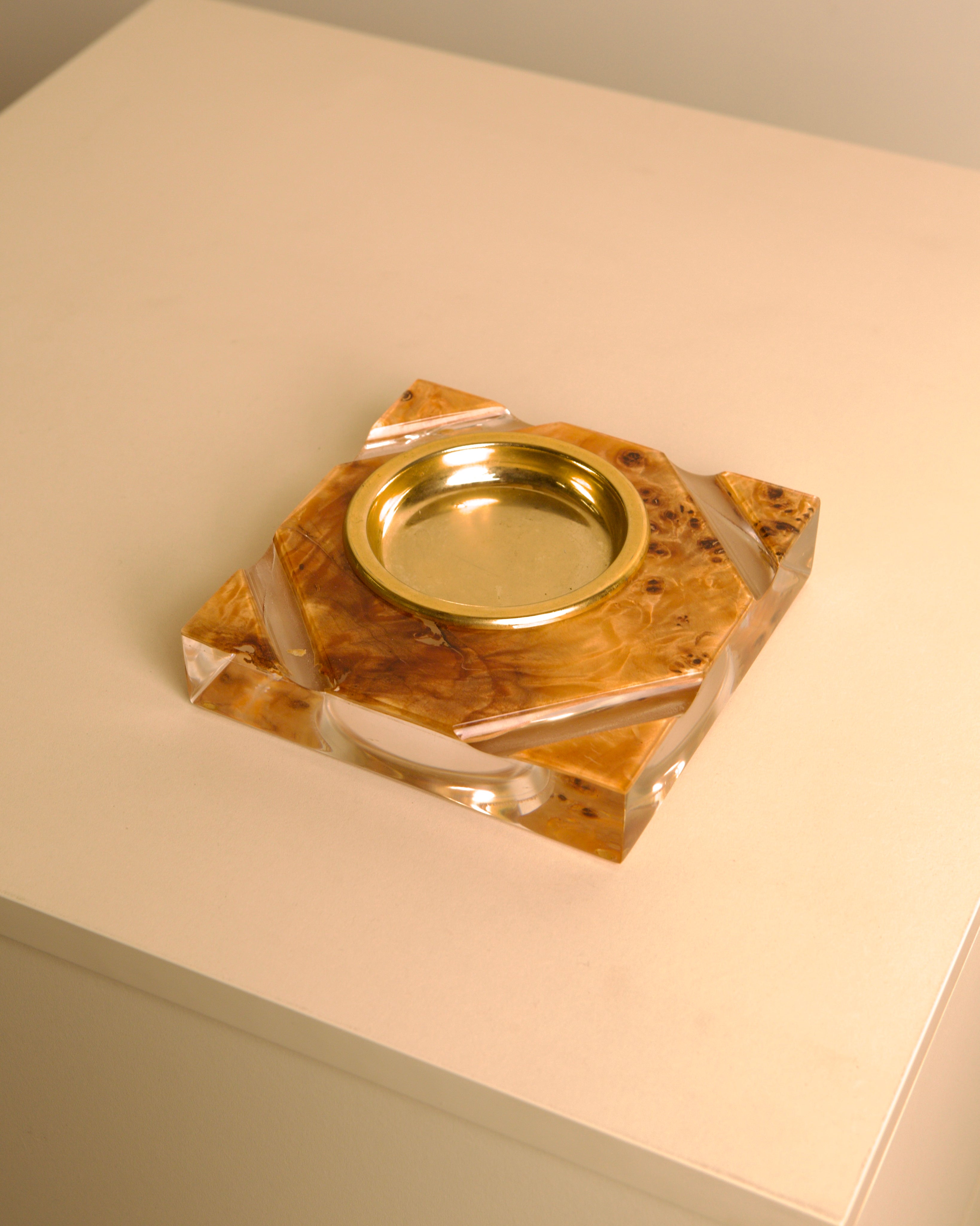 Italian catch-all in plexiglass with gilt metal and amber burl wood lid, 1970s — side angle