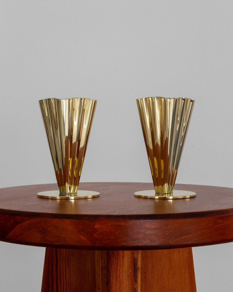 Pair of golden brass fluted vases on teak table, 1950s Scandinavian