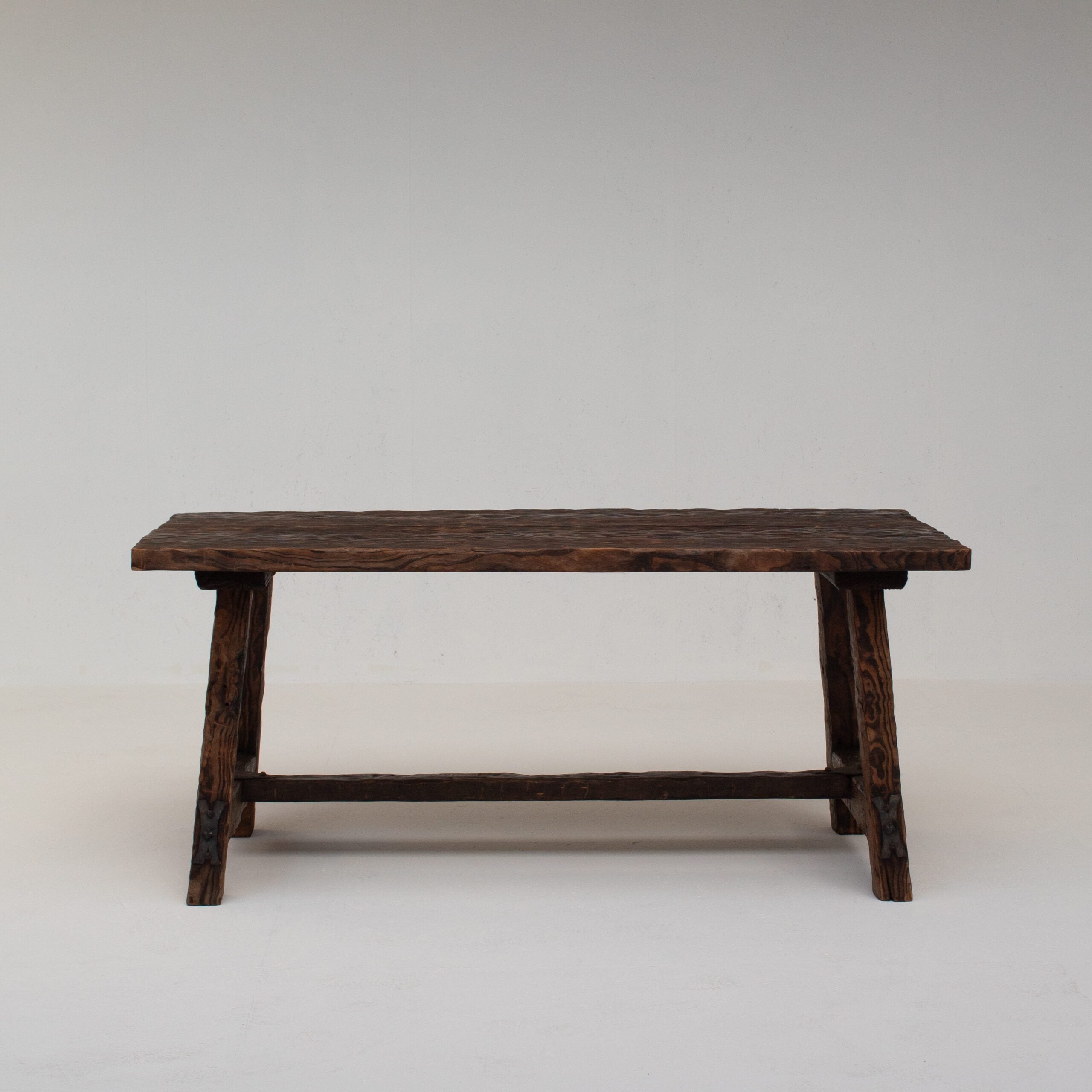 Brutalist Solid Wood Coffee Table — back view highlighting dark wood grain