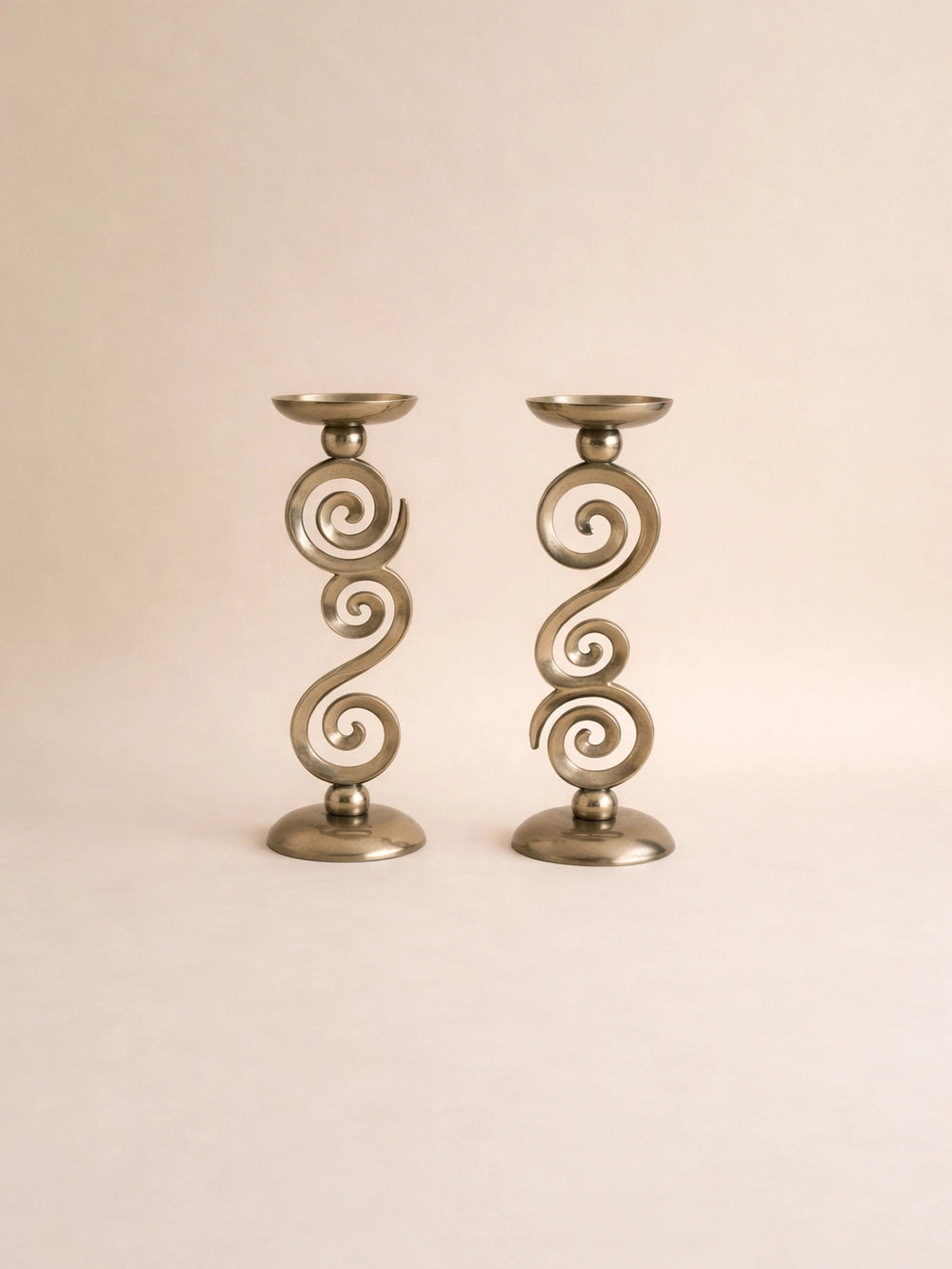 1990s Vintage Gold-tone Metal Swirl Candlesticks (Pair) — lifestyle setting