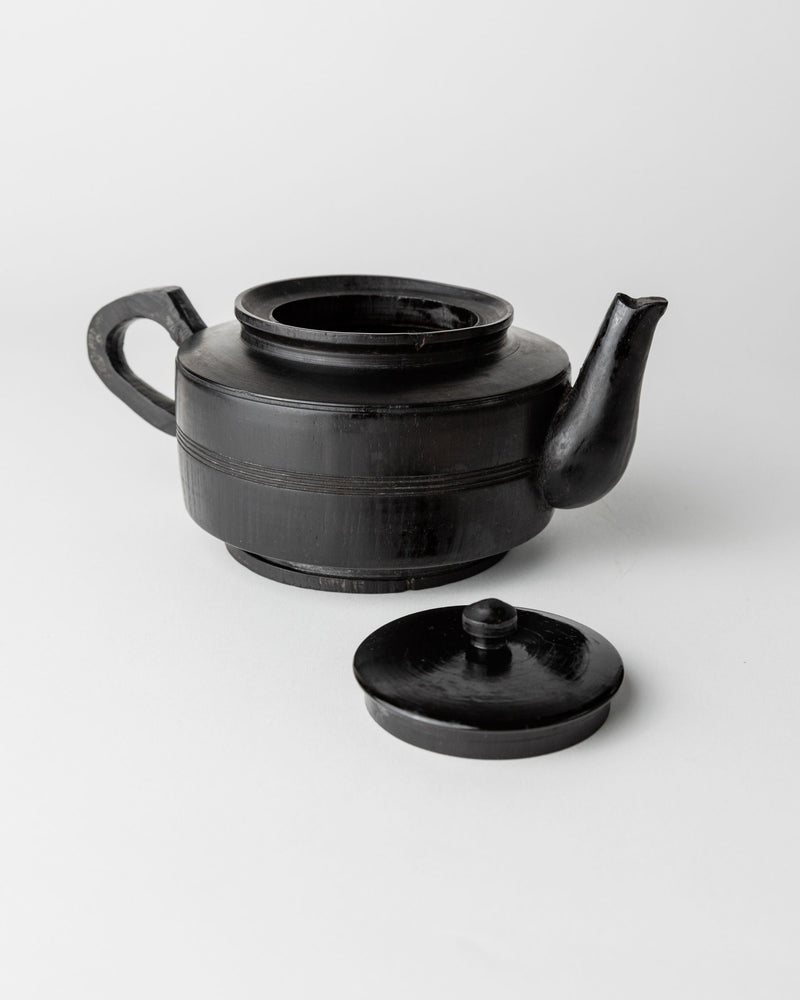 Handcarved Black Wood Teapot, 1920s — close-up of black wood texture