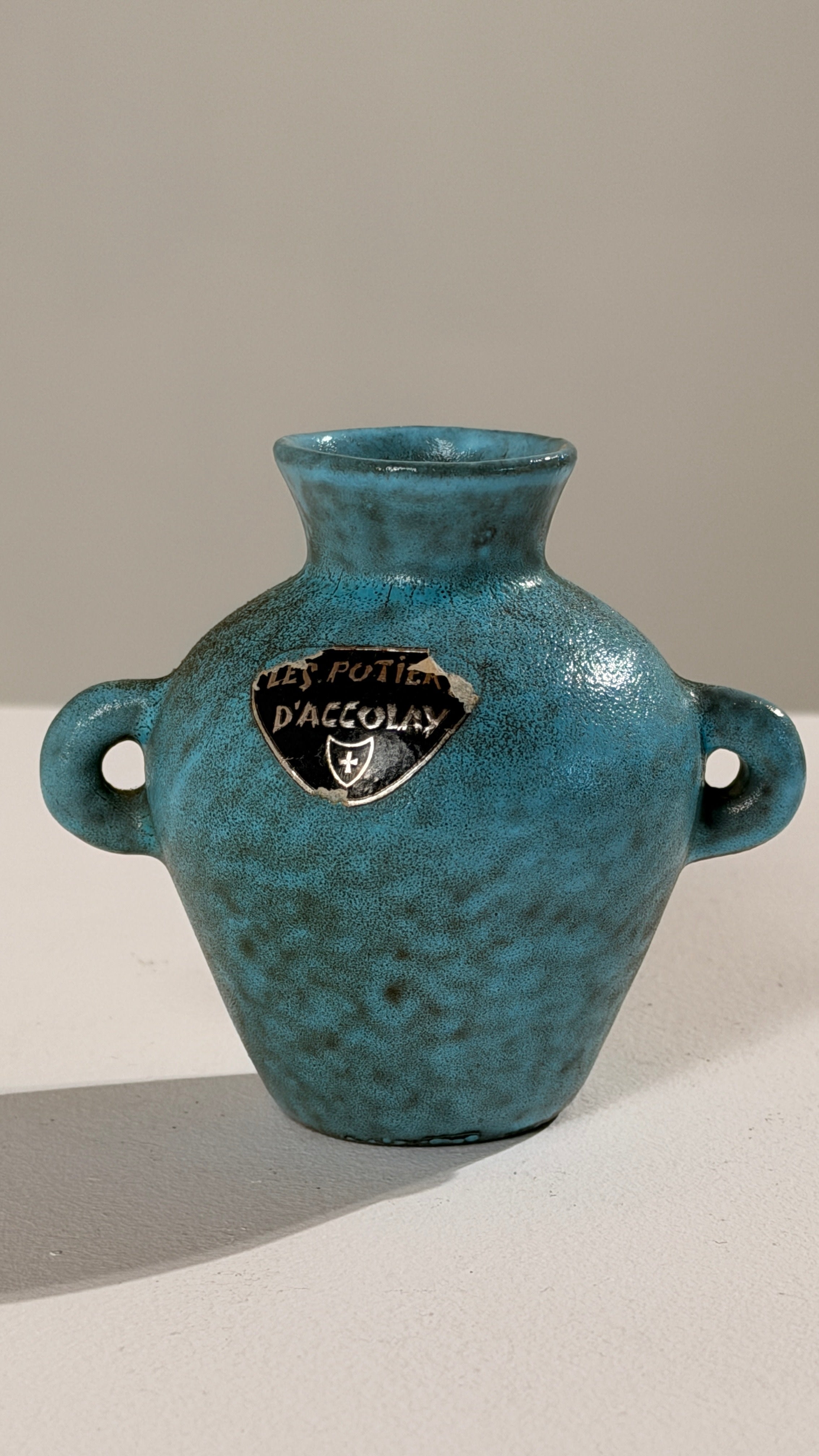 Small Ear-handled Vase by Potiers d'Accolay, France, circa 1960. — side angle showing textured turquoise ceramic surface