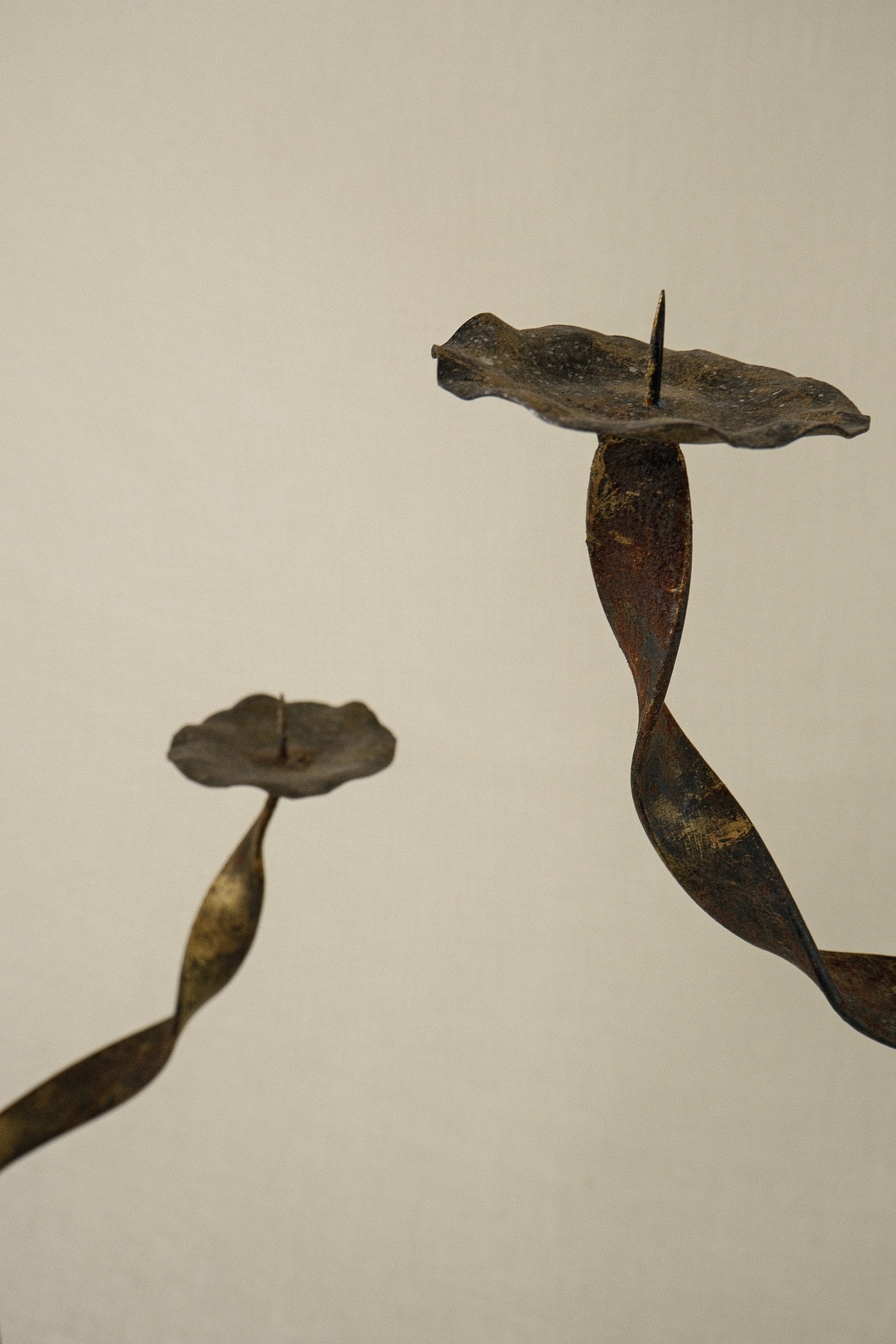 Pair of Gold-Patinated Iron Candlesticks — lifestyle setting