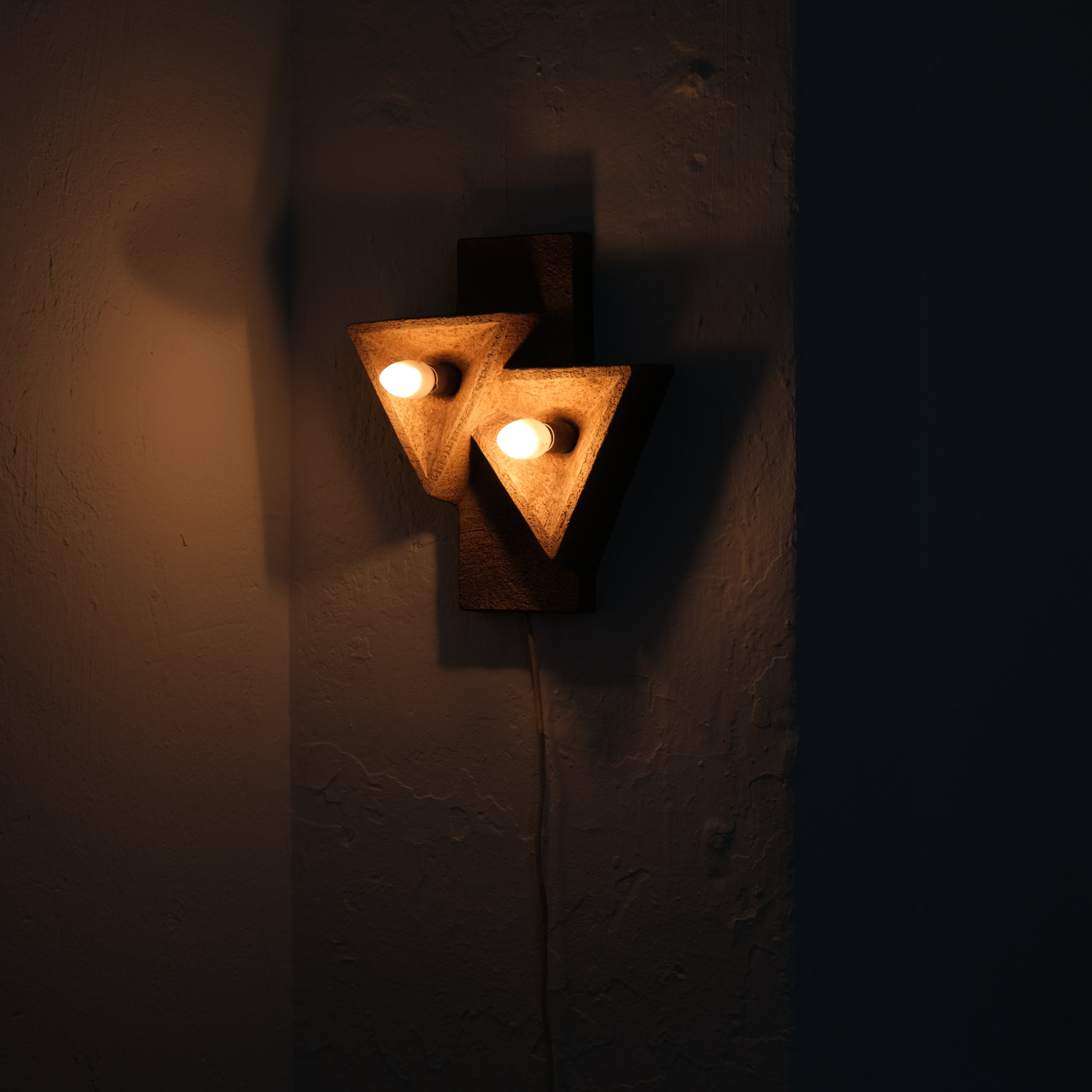 Dutch Organic Form Ceramic Wall Sconce, 1960s — back view with warm light glow