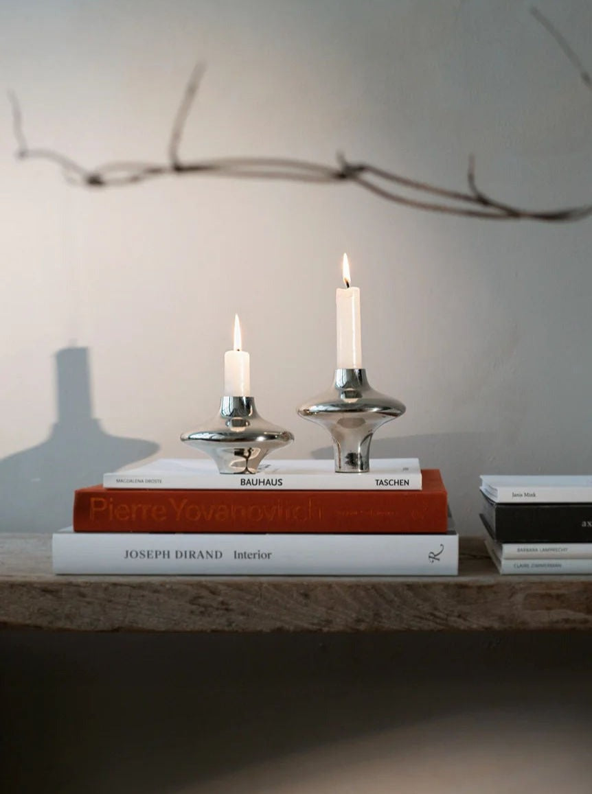 Doublet Candleholder - Small - Silver — positioned on wooden shelf with books