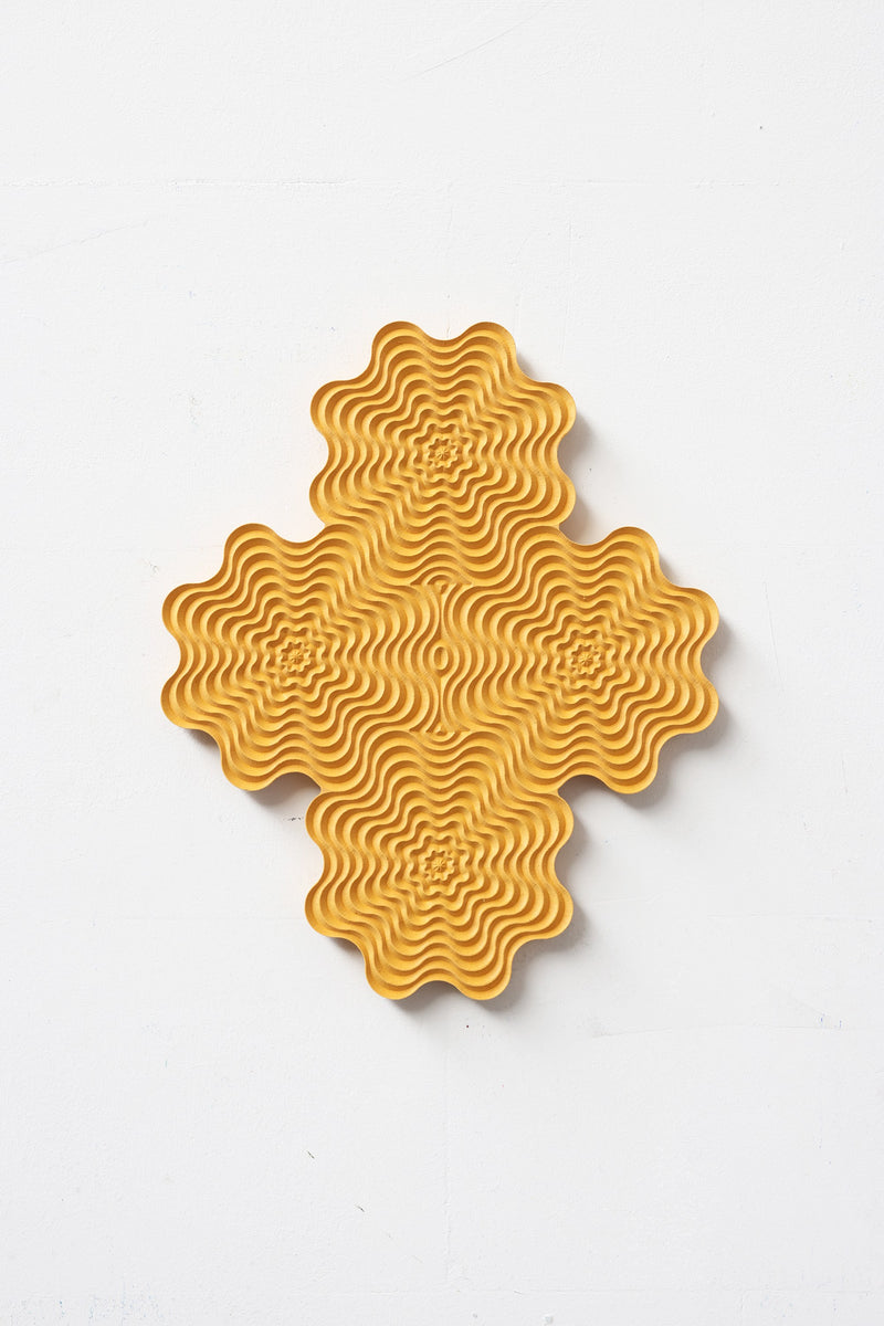 Dragonfish — close-up of textured yellow ceramic surface