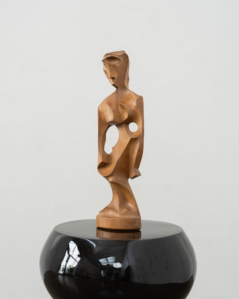 Cubist wooden figurative sculpture on black ceramic base, France 1960s