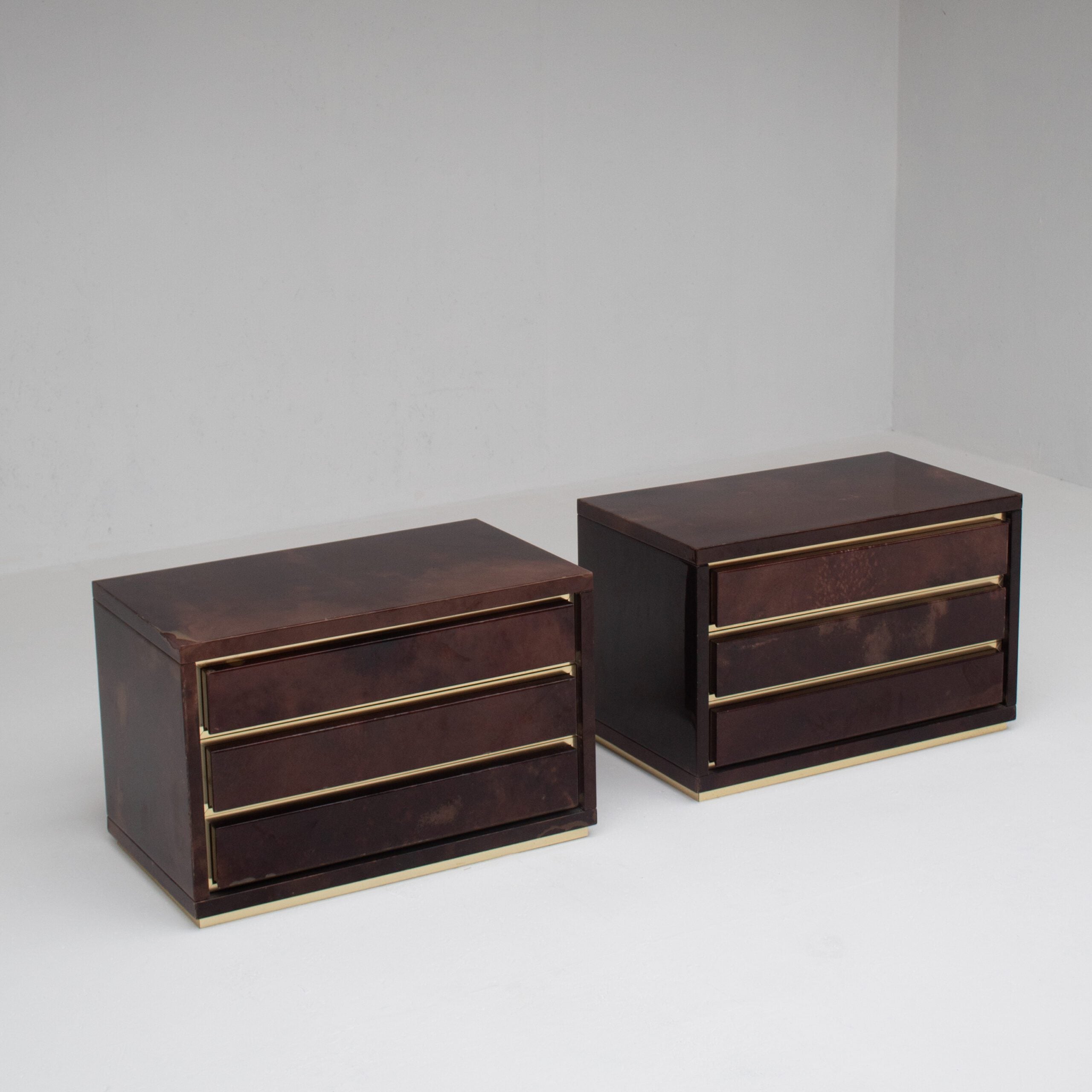 Pair of Aldo Tura (attr) Nightstands in Parchment and Brass — close-up of brass trim and drawer details