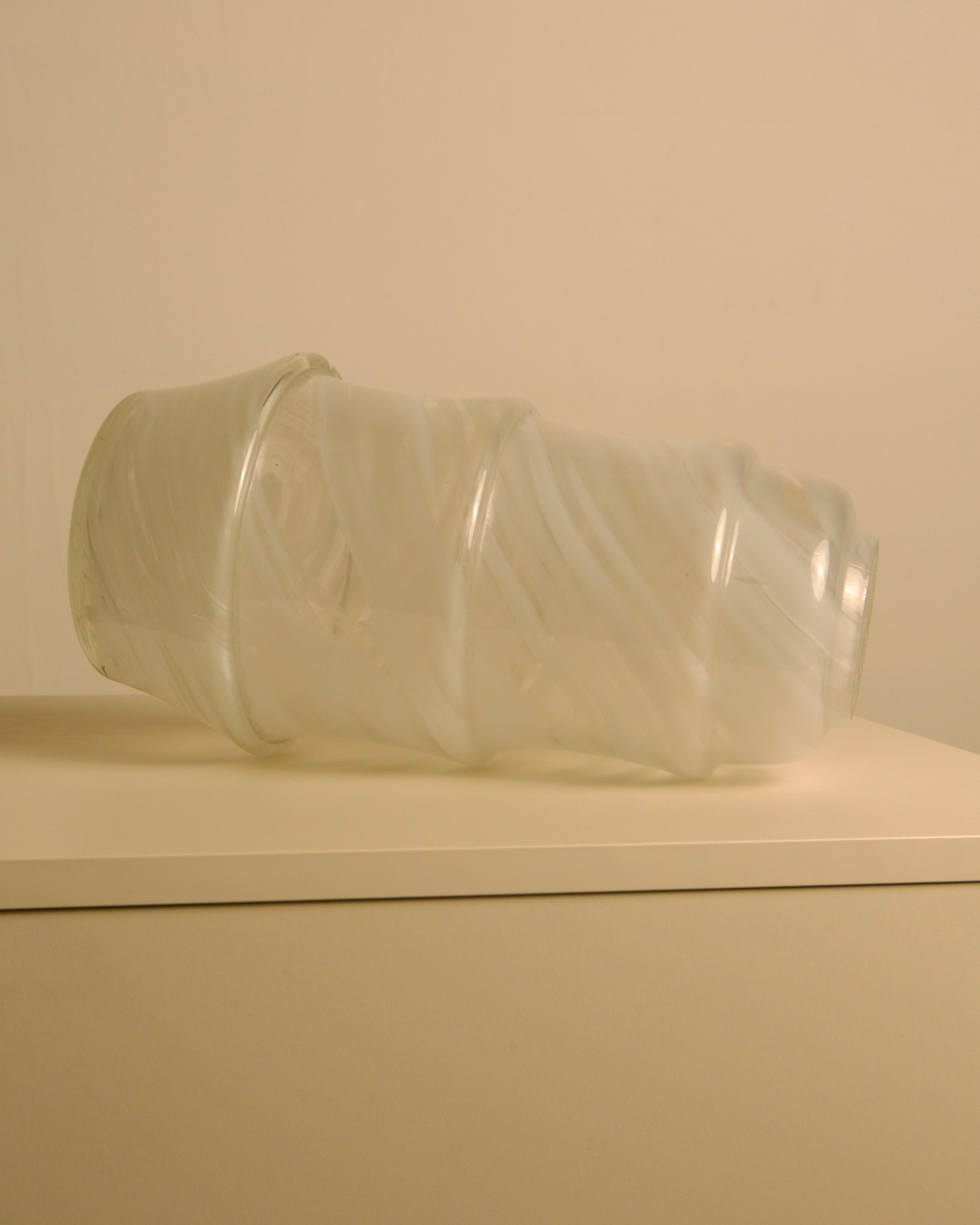 Large "Ghost" vase in Murano glass, 1980s — angled view on neutral surface