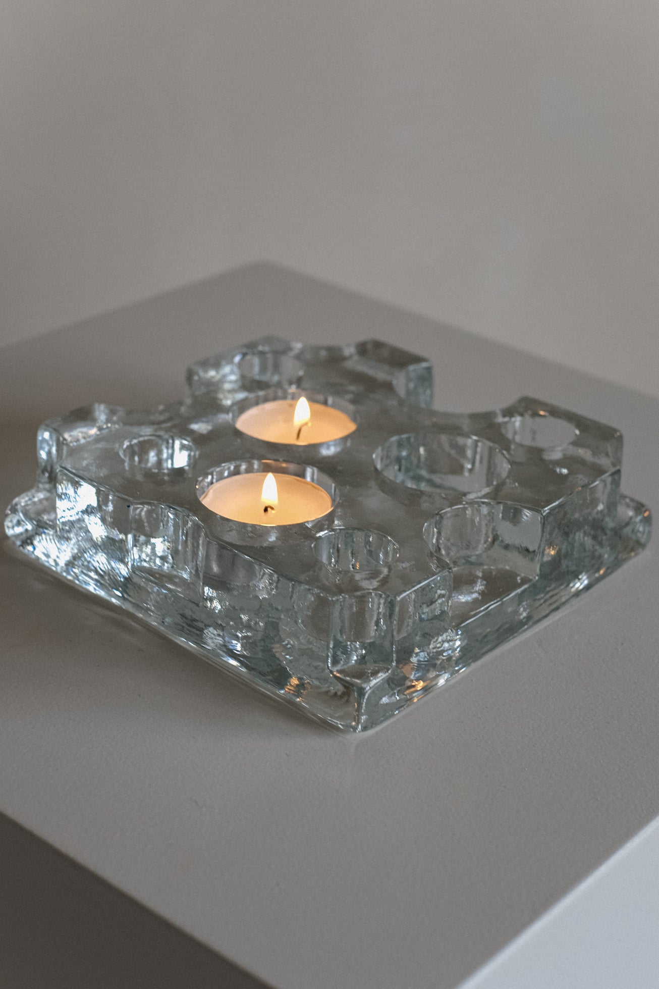 Glass Candle Holder — top view of clear glass with two candles