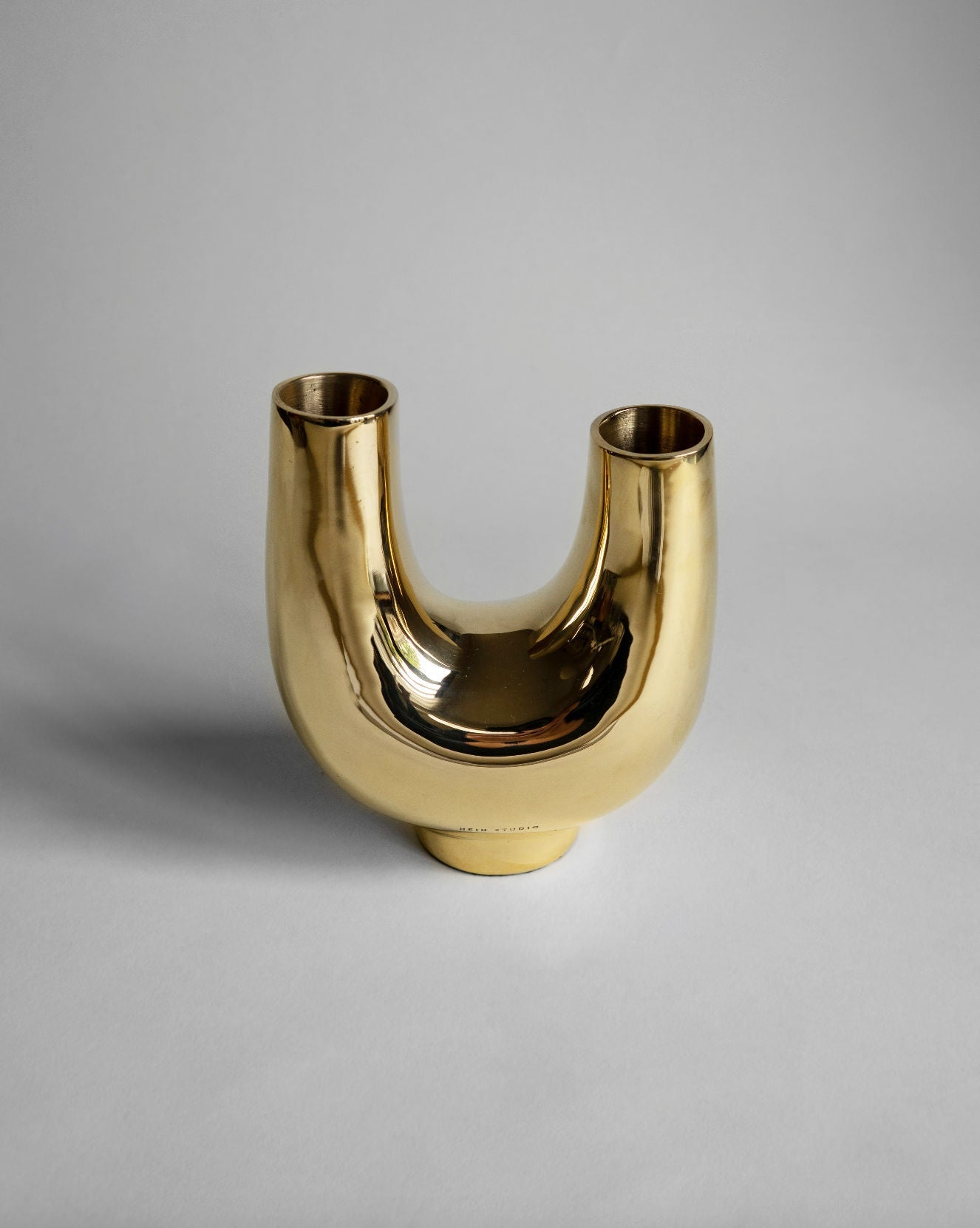 Kazumi Vase - Brass — side angle showing polished brass finish