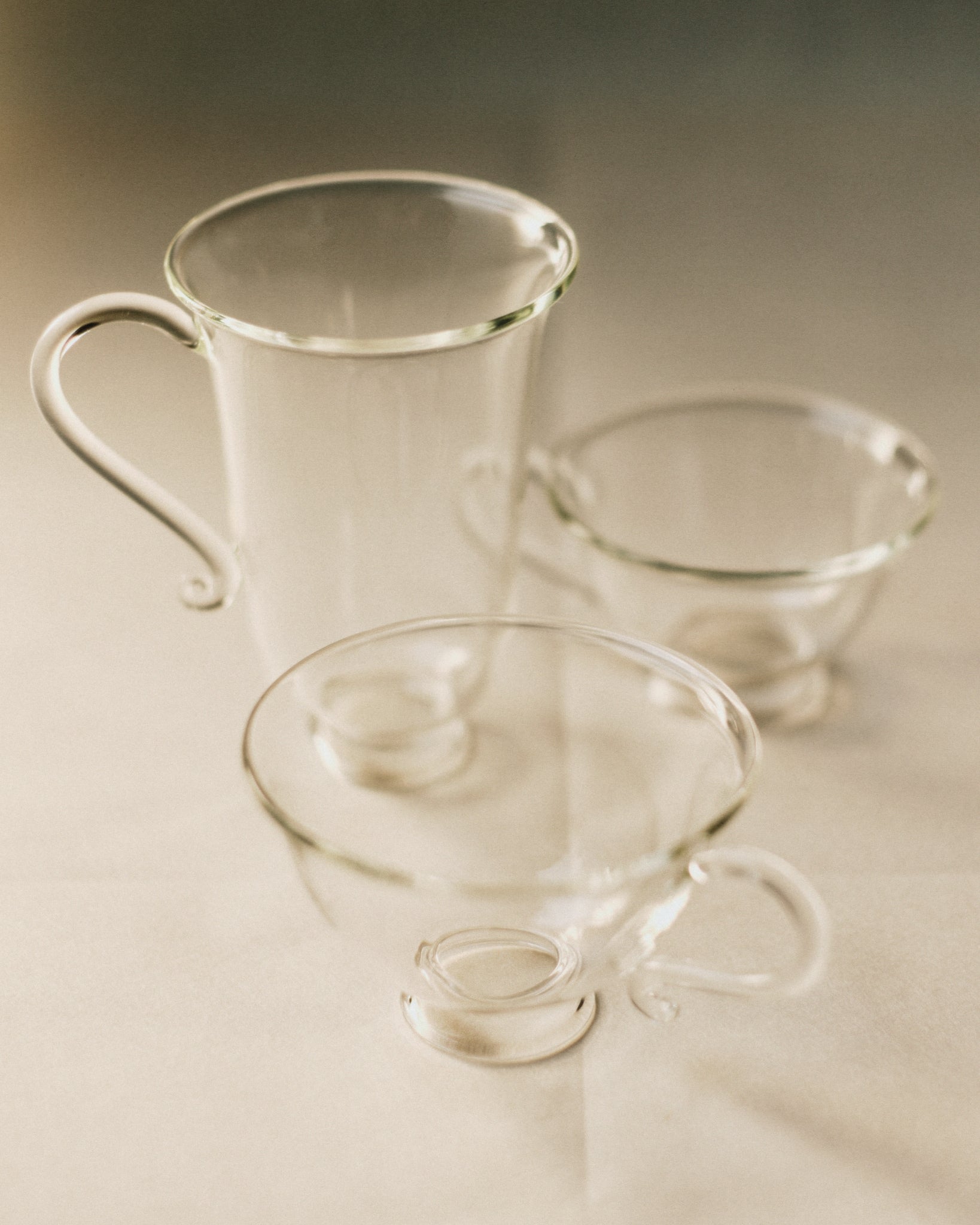 L'Espresso Set — three clear glass cups on neutral background
