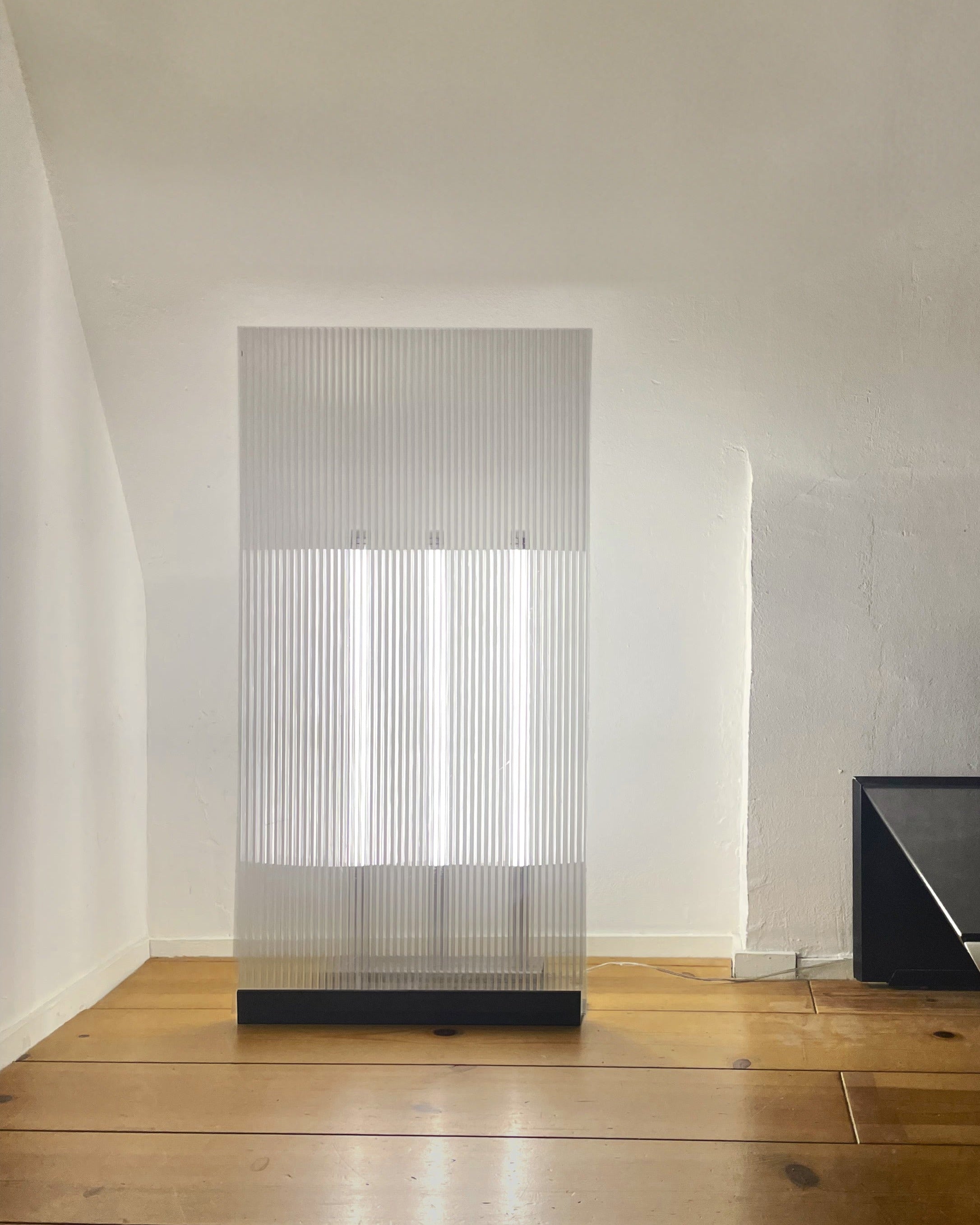 POLY-C-3 Floor Lamp — front view of ribbed acrylic design