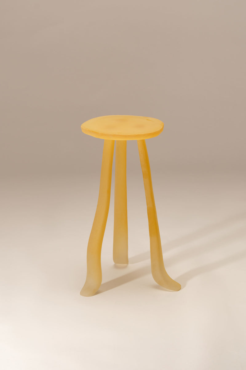 Lung 1.0 honey-colored wooden side table with curved legs by Szymon Keller