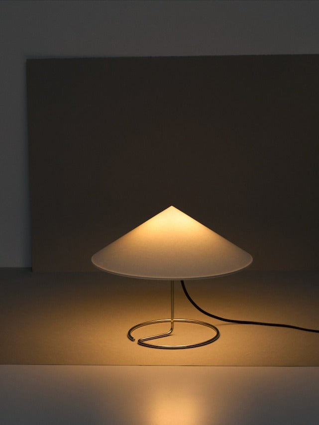 Douli Table Lamp — angled view with white shade and metal base